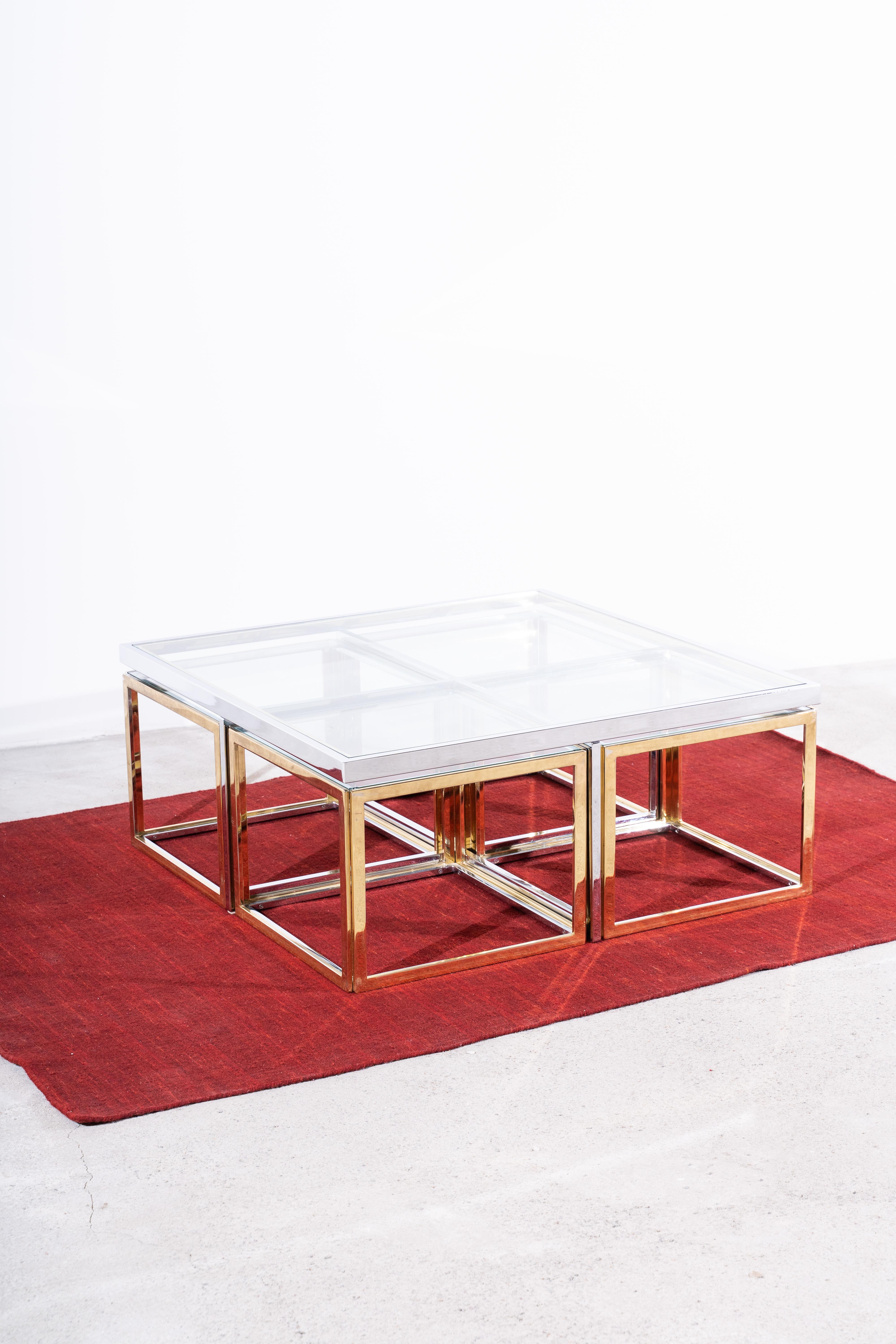 Extremely rare Maison Charles coffee table with 4 side tables in brassed and chromed steel. 

Very handy, because you can simply slide the four side tables under your table.

Maison Charles was originally founded in 1908 by Ernest Charles in the