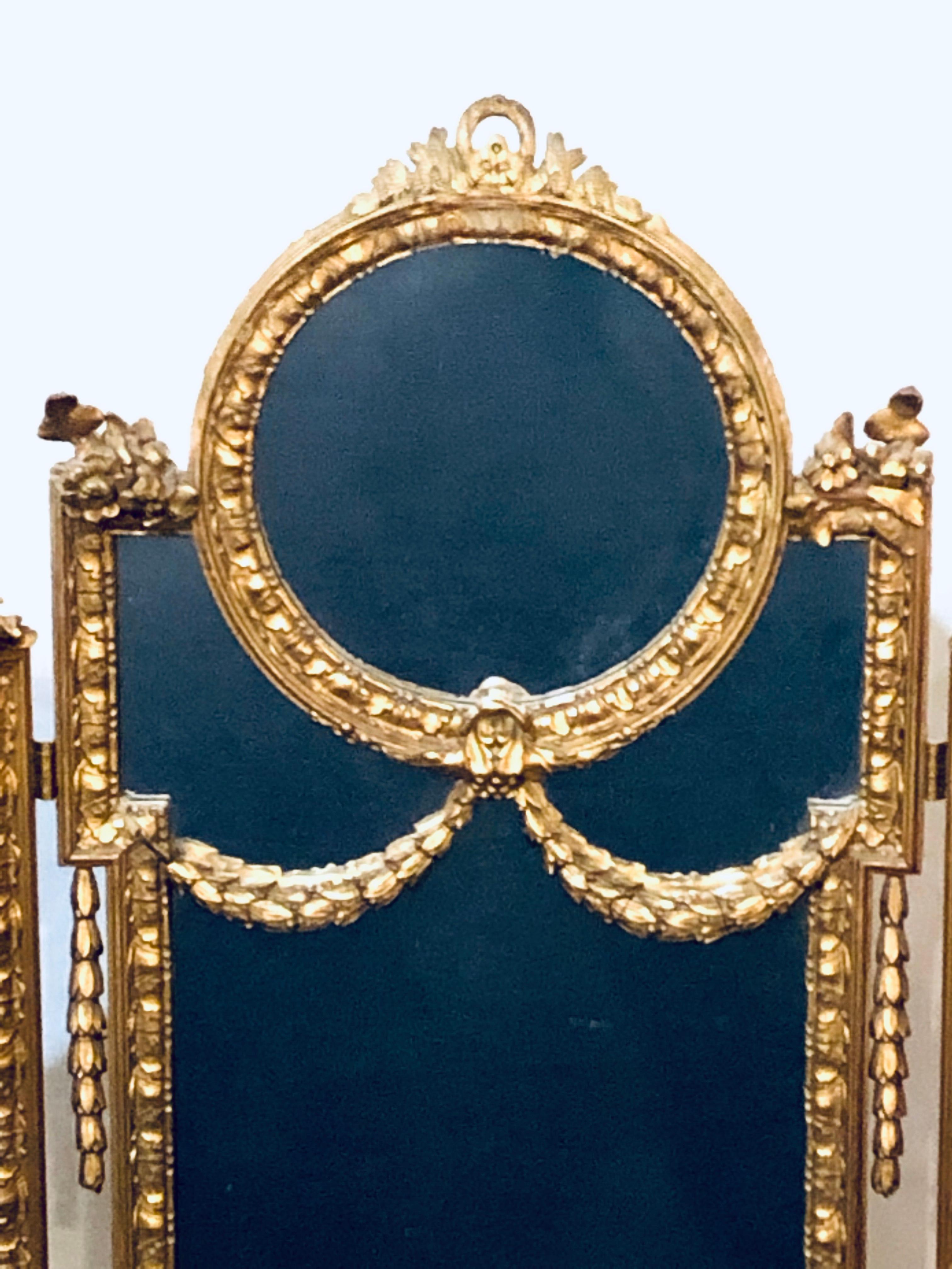 Hollywood Regency 1940s Louis XVI Style Gilt wood Trifold Vanity or Table Mirror In Good Condition In Stamford, CT