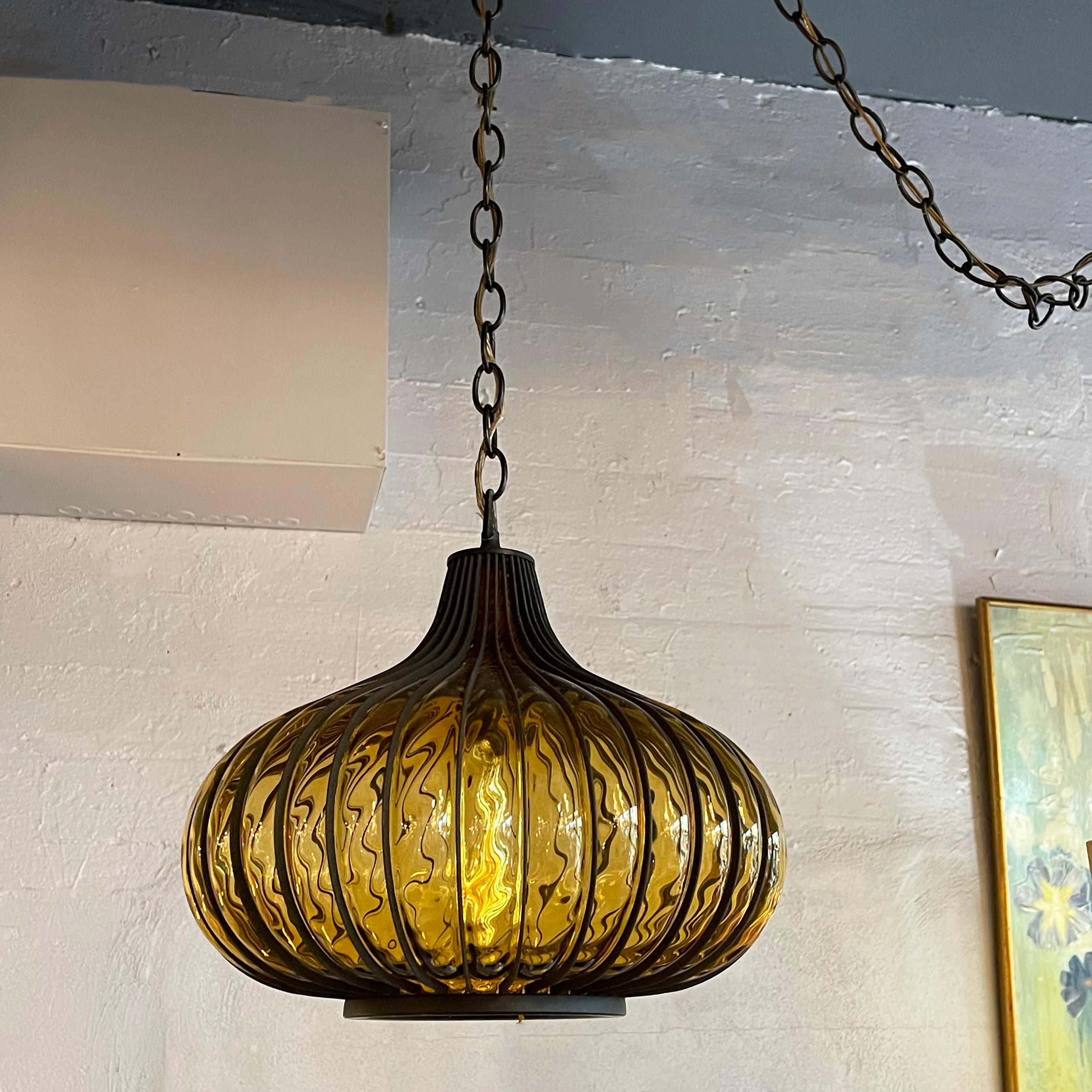 Hollywood Regency Amber Glass Caged Onion Swag Pendant Light In Good Condition In Brooklyn, NY