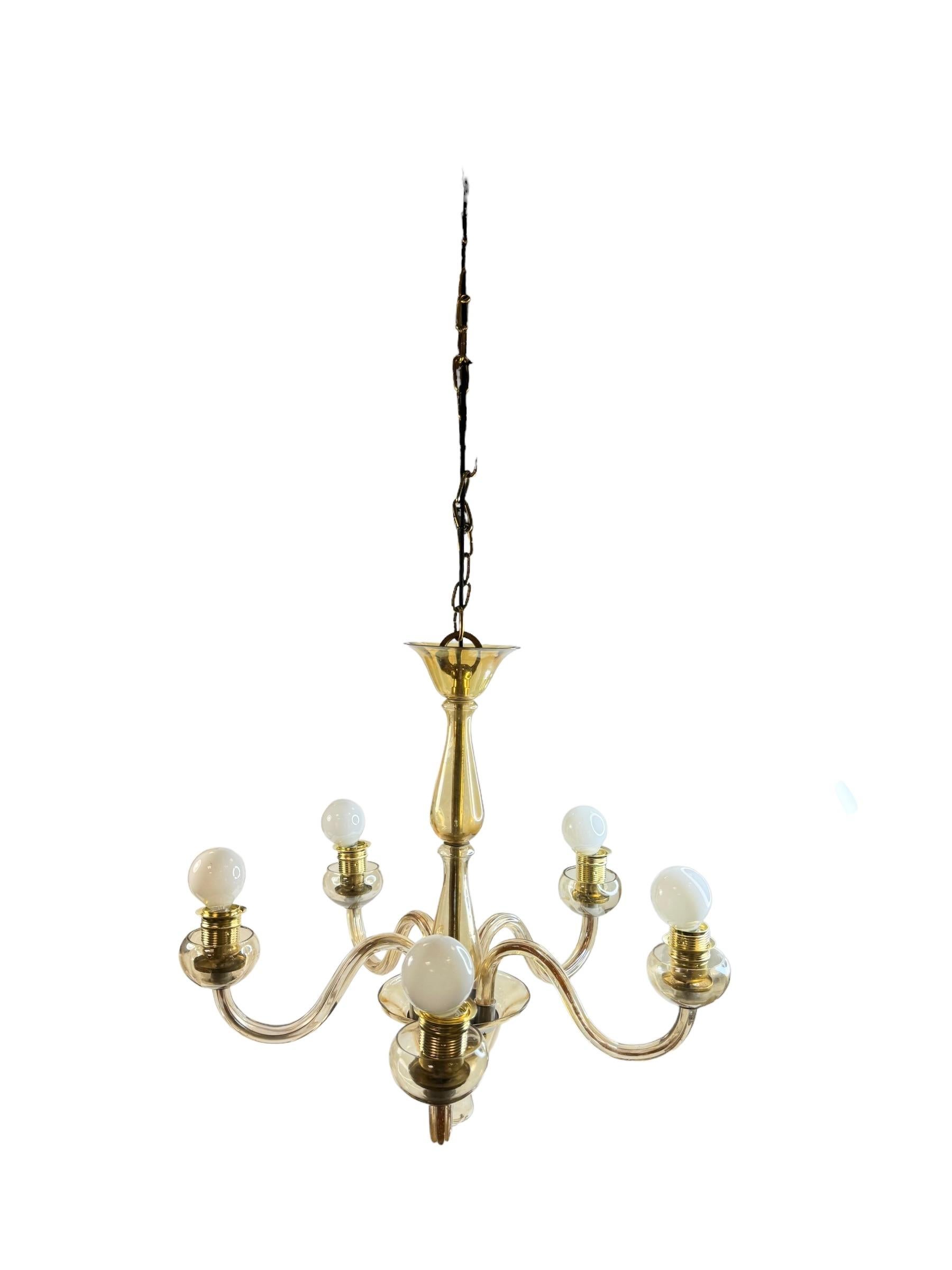 Stunning and beautiful chandelier. Made in Murano, Italy, circa 1930s or older. The Chandelier requires five European E27 / 110 Volt Edison bulbs, each bulb up to 100 watts. Its in all original as found condition, but has been rewired to meat the