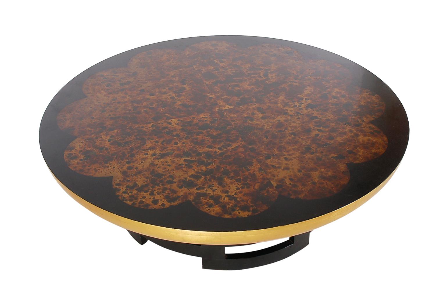 A beautiful and substantial piece designed by Muller and Barringer for Kittinger. It consists of solid wood construction, black base, with faux tortoiseshell top. Very rich and sophisticated looking.