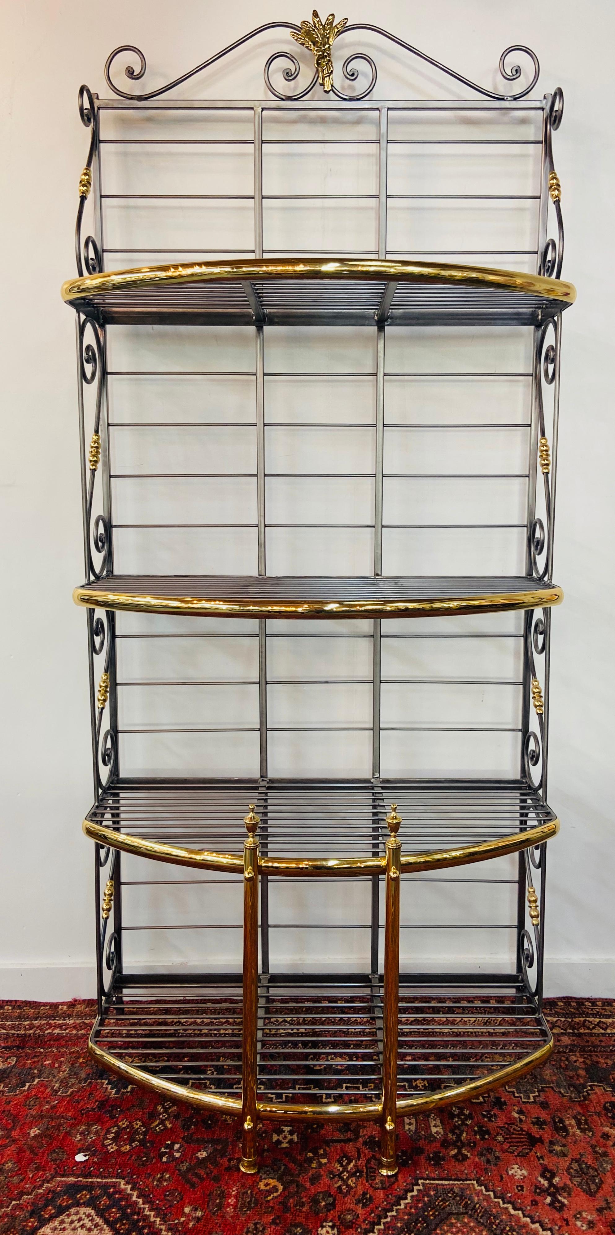 A timeless early 20th century Bakers rack or shelves four large shelves made of wrought iron and brass. This 1930s antique Parisian boulangerie rack is great to display books, collections etc. and will look beautiful in any space your room weather