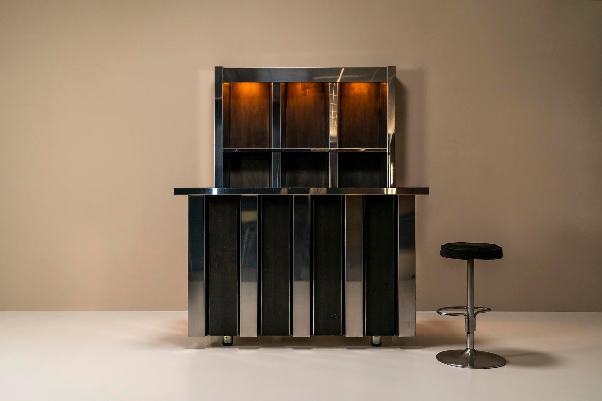 Hollywood Regency bar in aluminum and black suede in the style of Willy Rizzo.Imagine a glamorous cocktail evening with friends or a place where you can enjoy a cappuccino in the morning. This typical Hollywood regency style bar designed by Willy