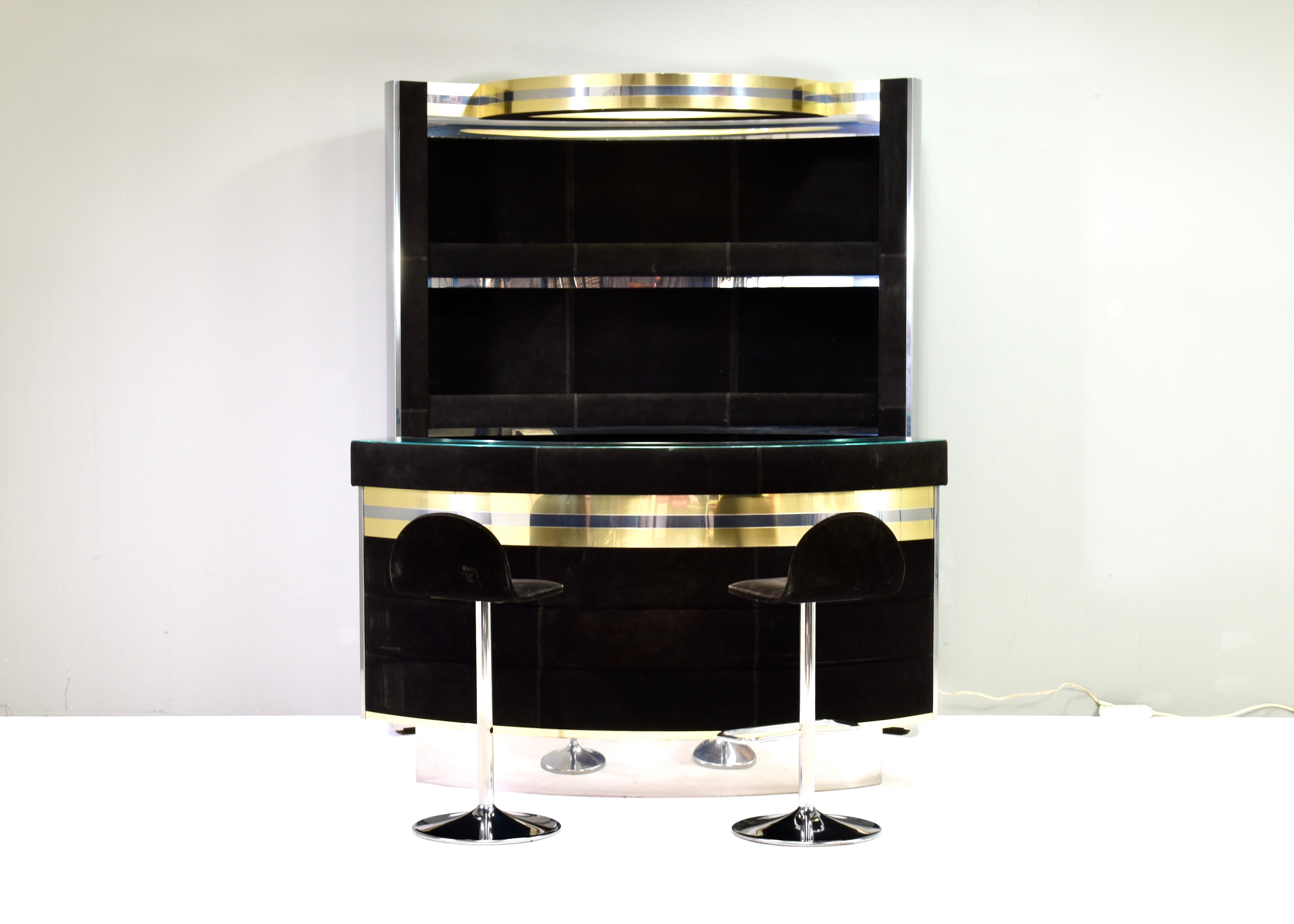 Vintage 1970s Willy Rizzo (Style) Cocktail Bar.
The barstools are exactly the same as the only documented and most common offered model by Willy Rizzo so this one most likely is also an original Willy Rizzo bar. The manor of design is also the same