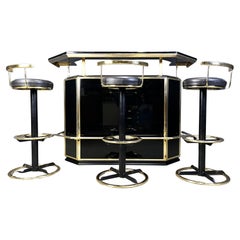 Hollywood regency bar with three stools, 1970s