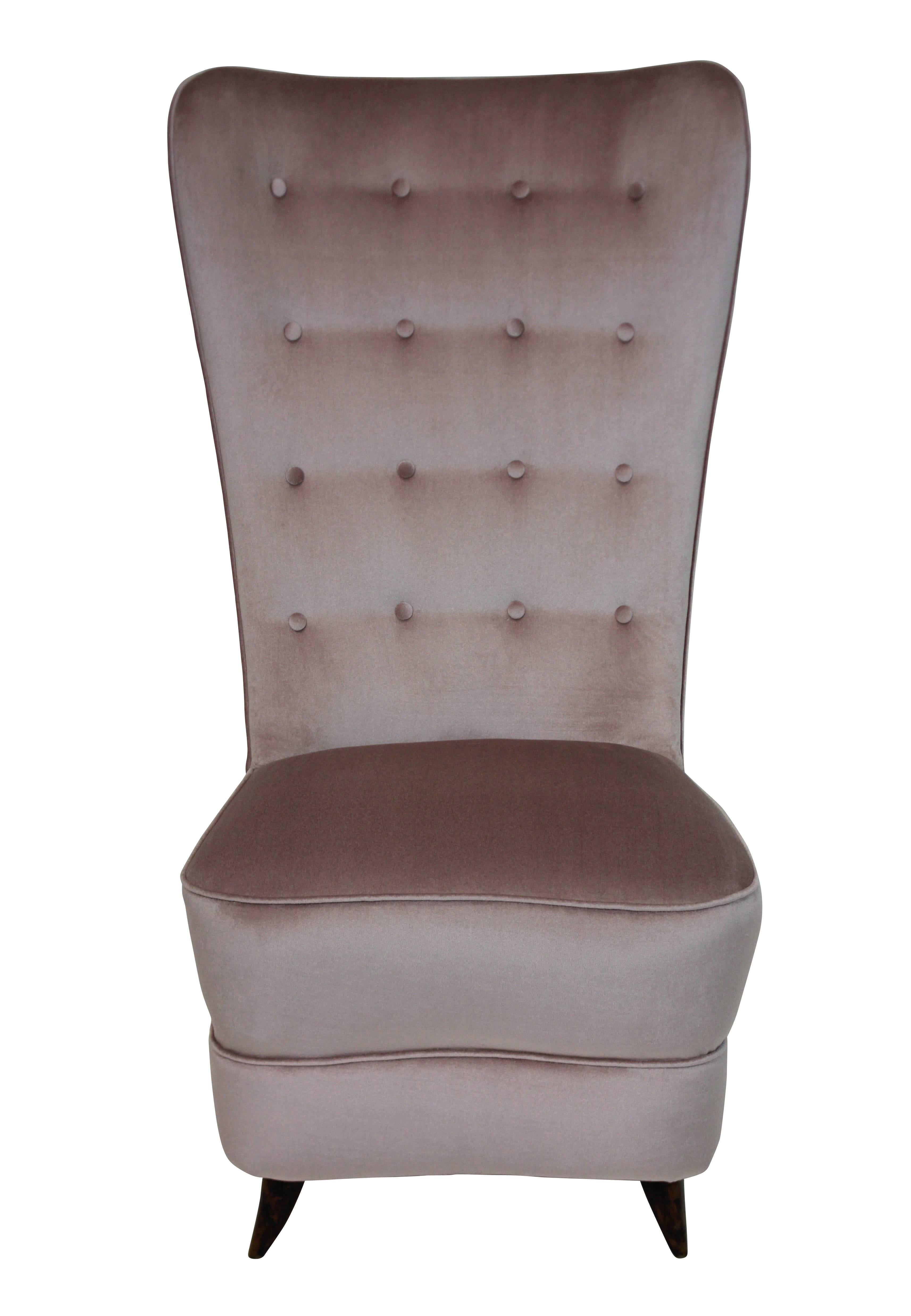 A Hollywood Regency bedroom chair with gently curved high button back and unusual legs. Newly upholstered in pale pink velvet.

 