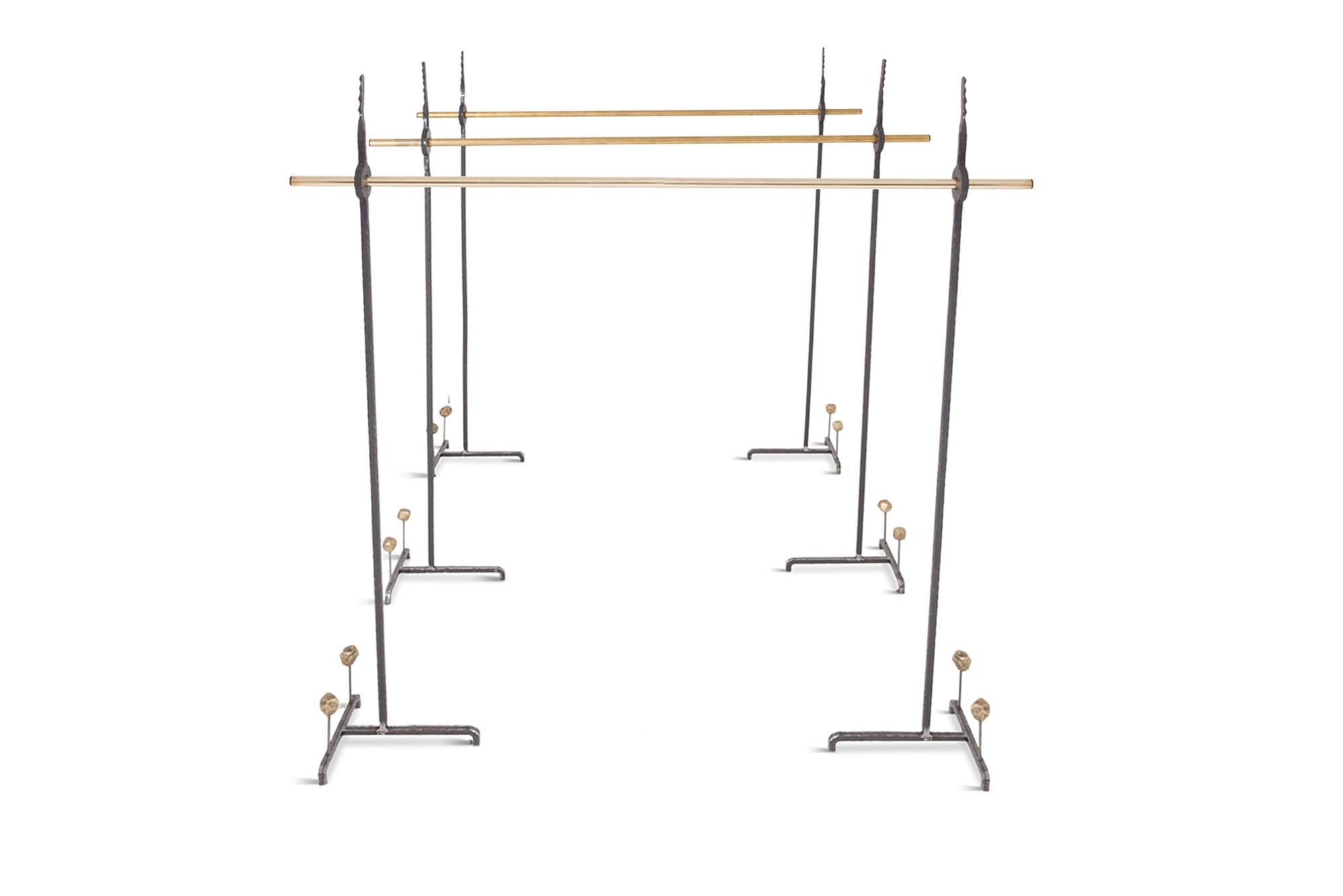 Contemporary clothing racks by Thomas Serruys for Studio Goldwood.
Custom designed for the Poiret showroom.

Brutalist Wrought and forged iron elements combined with chic brass details make this a very a la mode design.

Suits well in a