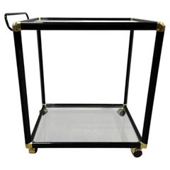 Hollywood Regency Black and Gold-Tone Two-Tier Glass Bar Cart or Tea Cart