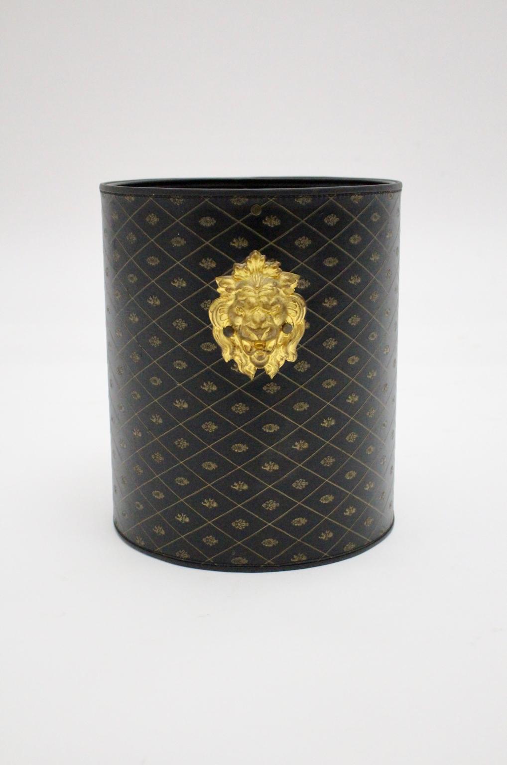 This extraordinary Hollywood Regency leather paper basket was made of brown and black leather with patterns.
Also it is worth to mentioned that the leather surface of the paper basket is decorated with rhomb patterns and emblems. The figures of the