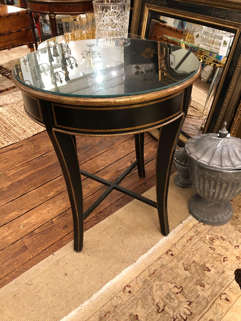 Hollywood Regency Black and Gold Round Center Table For Sale at 1stDibs
