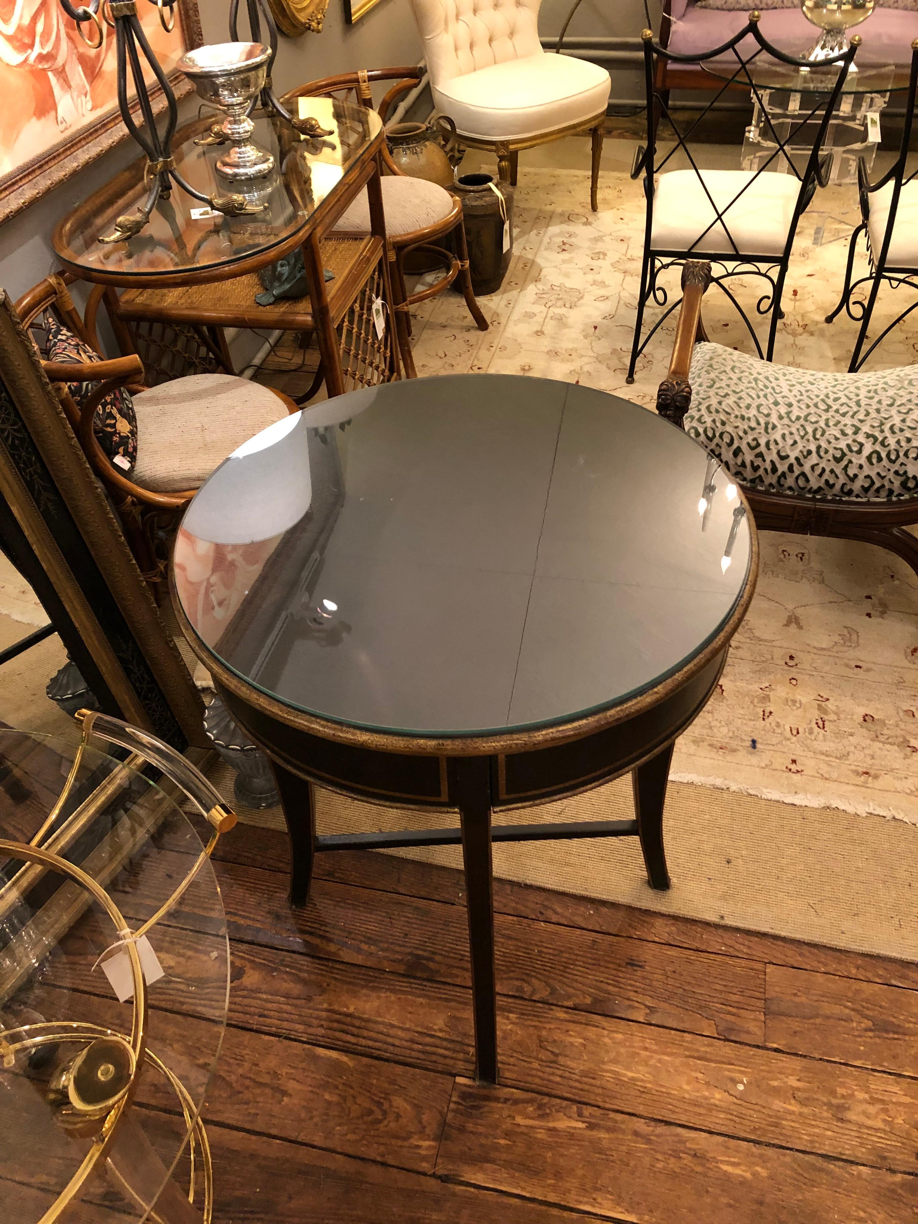 Late 20th Century Hollywood Regency Black & Gold Round Center Table