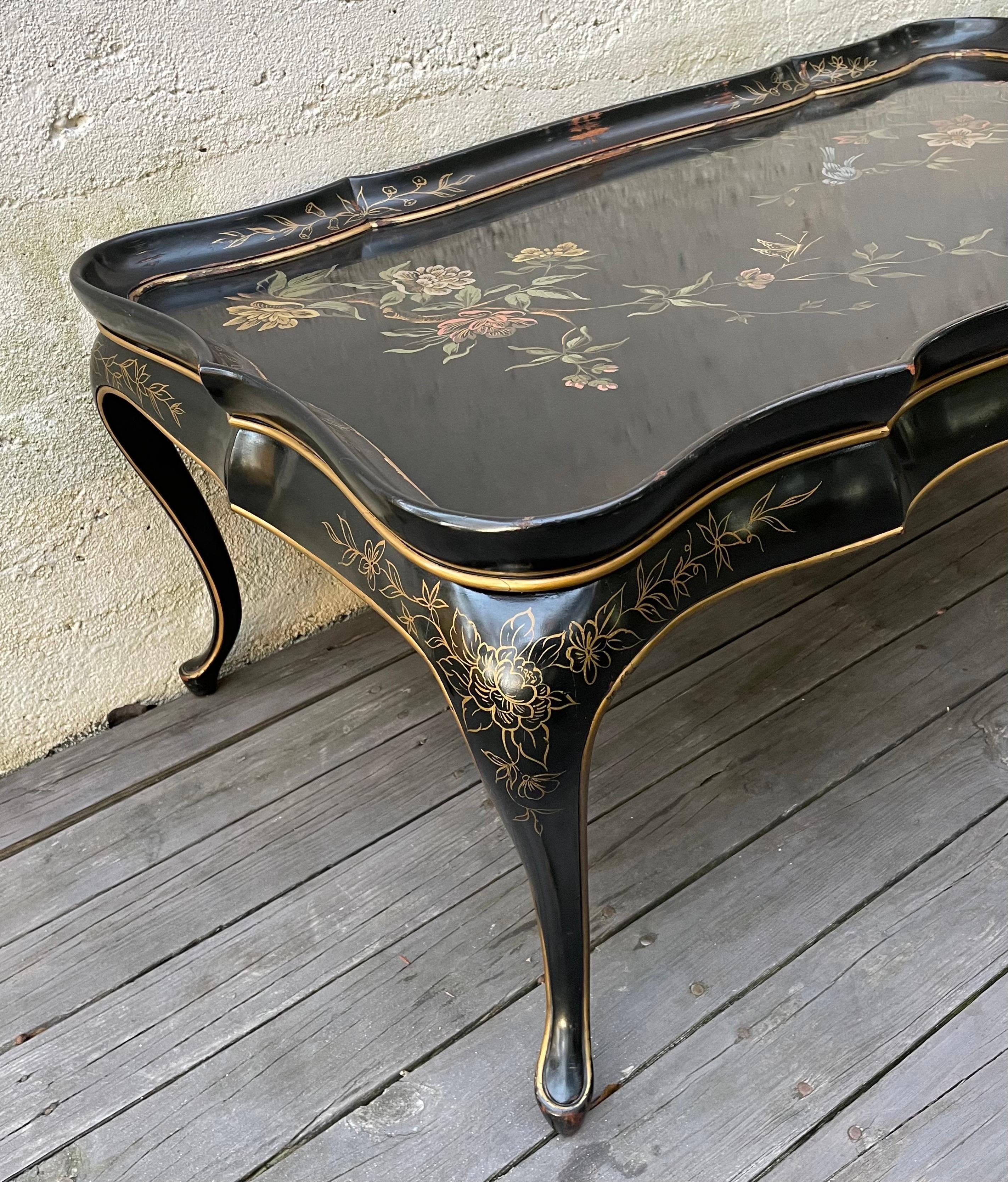Japanese Hollywood Regency Black Lacquered Coffee Table with Hand Painted Floral Design For Sale