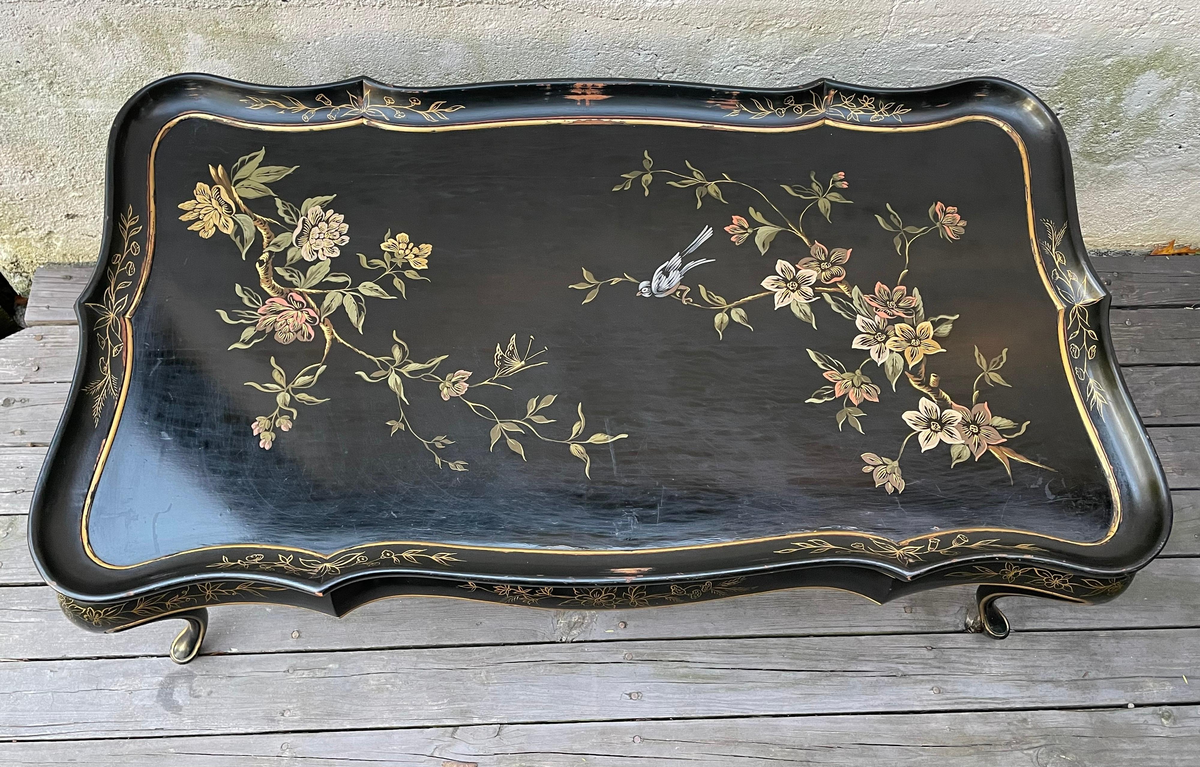 Hollywood Regency Black Lacquered Coffee Table with Hand Painted Floral Design In Good Condition For Sale In Bedford Hills, NY