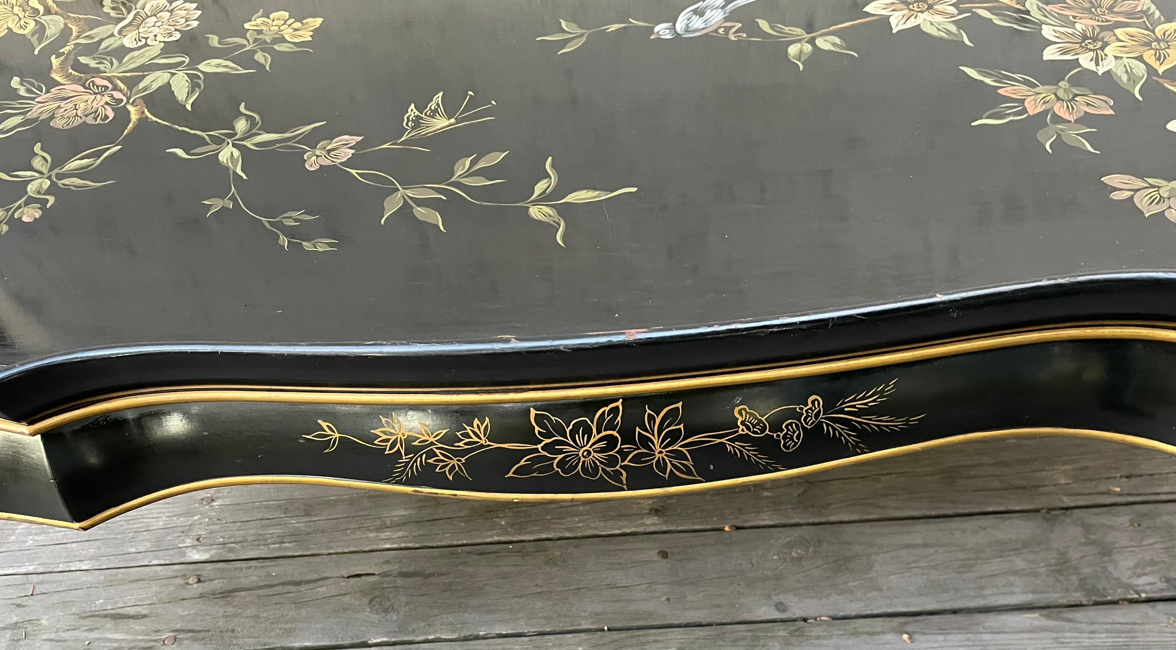 Wood Hollywood Regency Black Lacquered Coffee Table with Hand Painted Floral Design For Sale