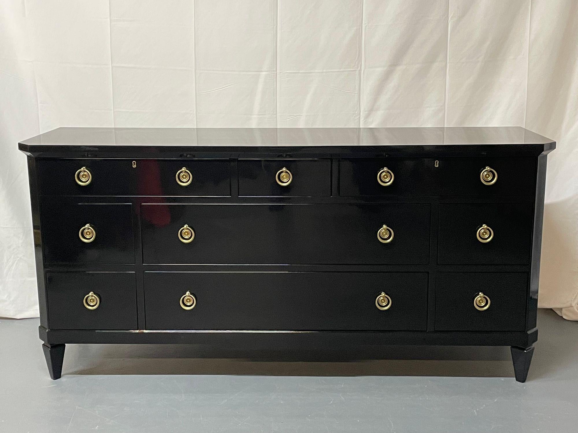Hollywood Regency Black Lacquered Dresser, Chest, Sideboard, Refinished
 
Black Lacquered Nine Drawer Kittinger Antique Dresser, Sideboard. A simply spectacular dresser from Buffalo NY having a small center drawer flanked by two larger drawers, over