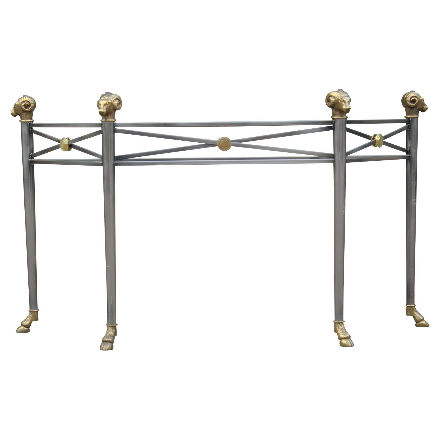 Hollywood Regency brass and brushed nickel ram's head console or sofa table base in the style of Maison Jansen.