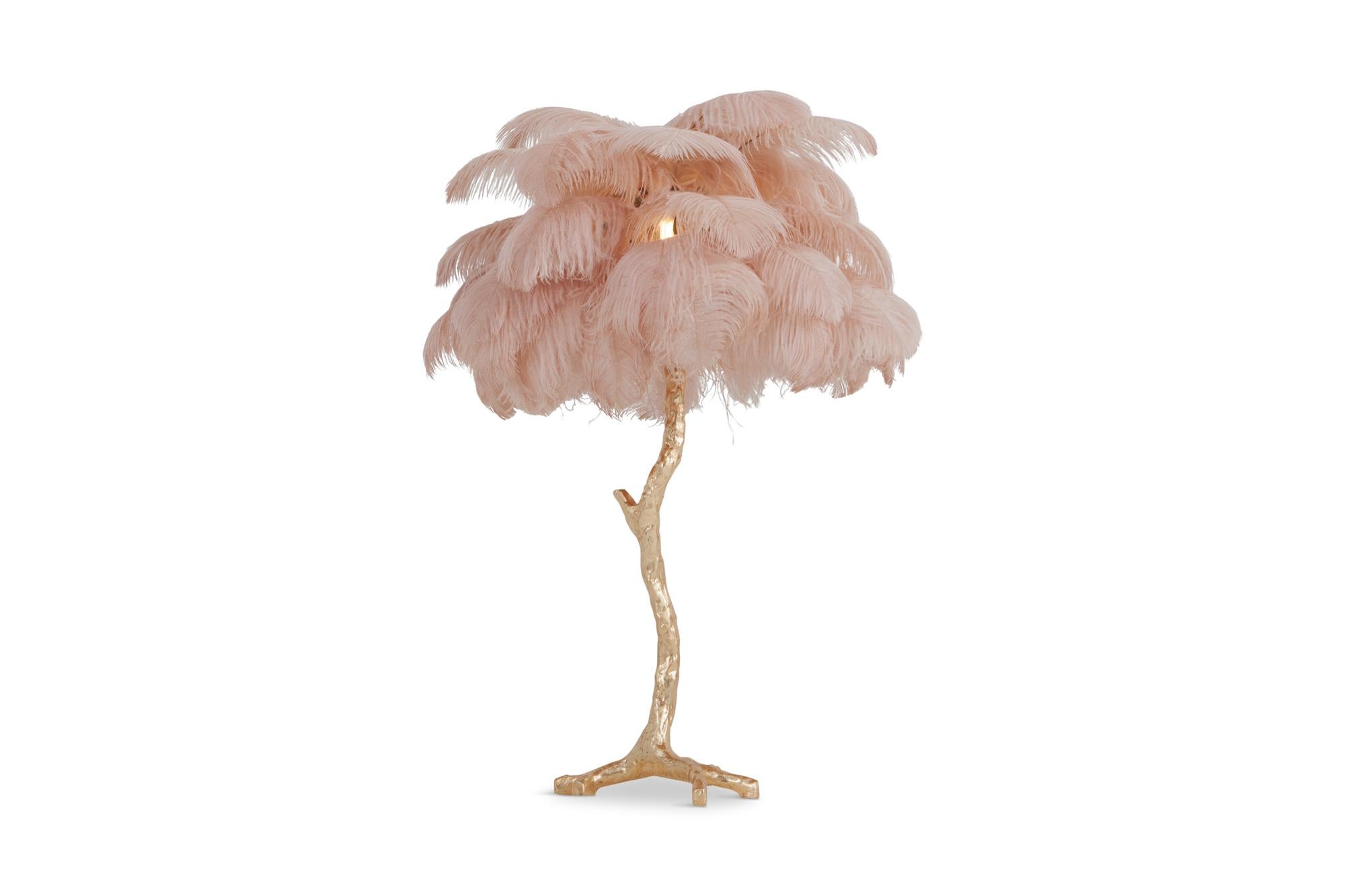 Contemporary lamp with golden resin stem and pink colored ostrich feathers

Decorative luxury piece that fits well in an eclectic Hollywood Regency inspired metropolitan interior

we can also offer the larger floor lamp model.
 