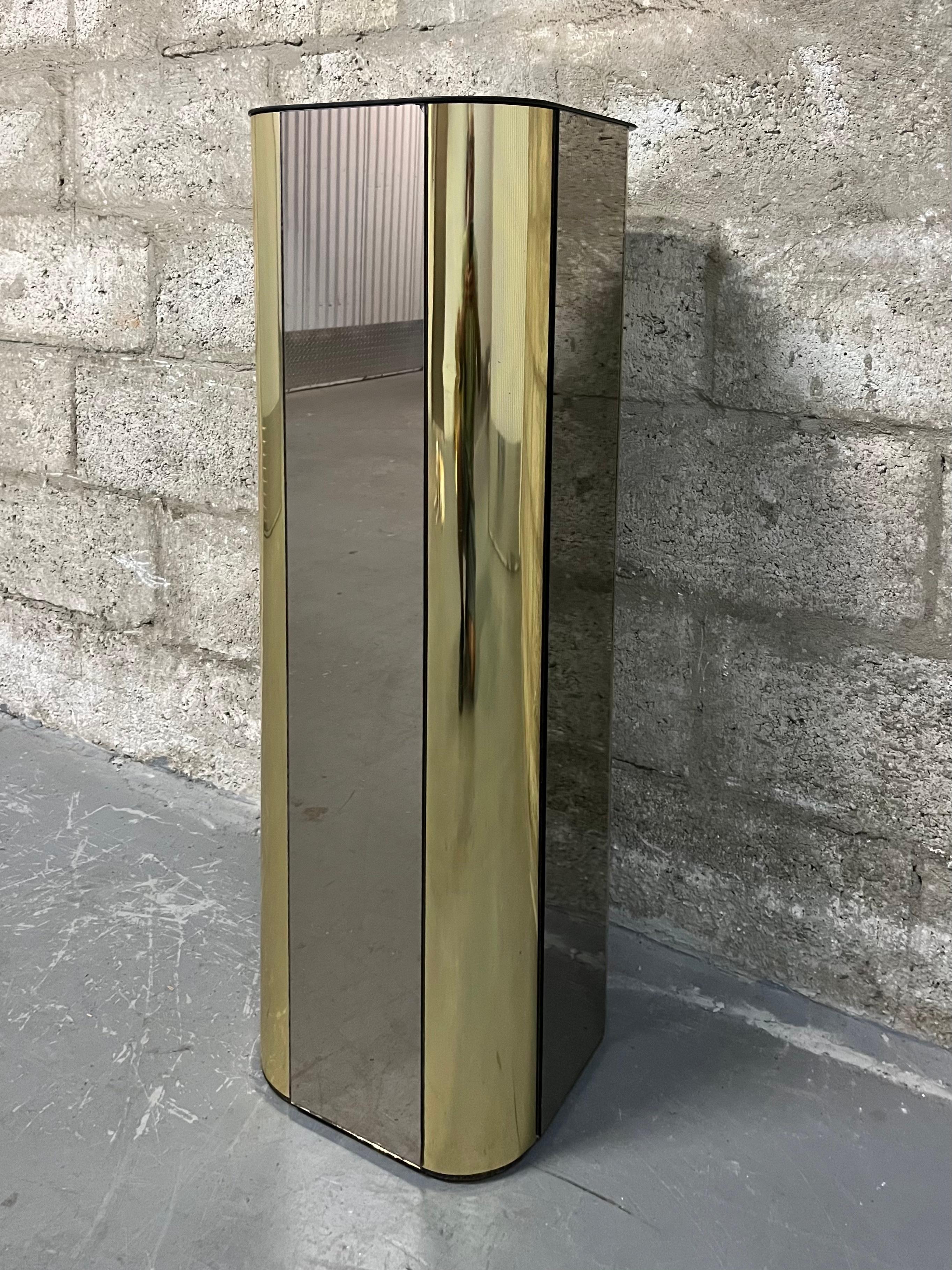 Plated Hollywood Regency Brass and Smoked Mirror Pedestal in the Curtis Jere's Style.