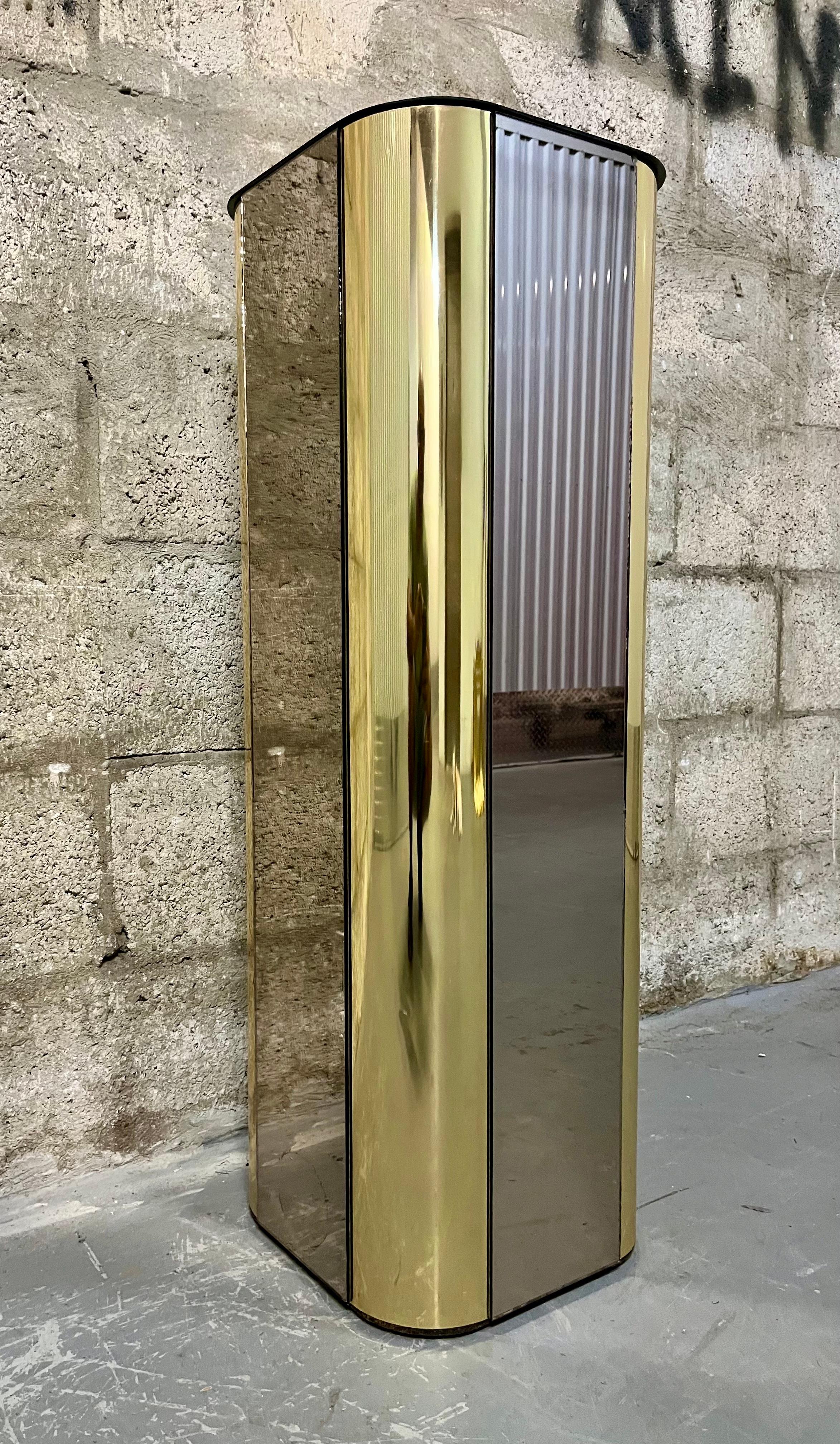 Hollywood Regency Brass and Smoked Mirror Pedestal in the Curtis Jere's Style. 1