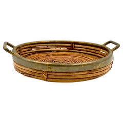 Used Hollywood regency brass and wicker vide poche, Italy ca. 1970
