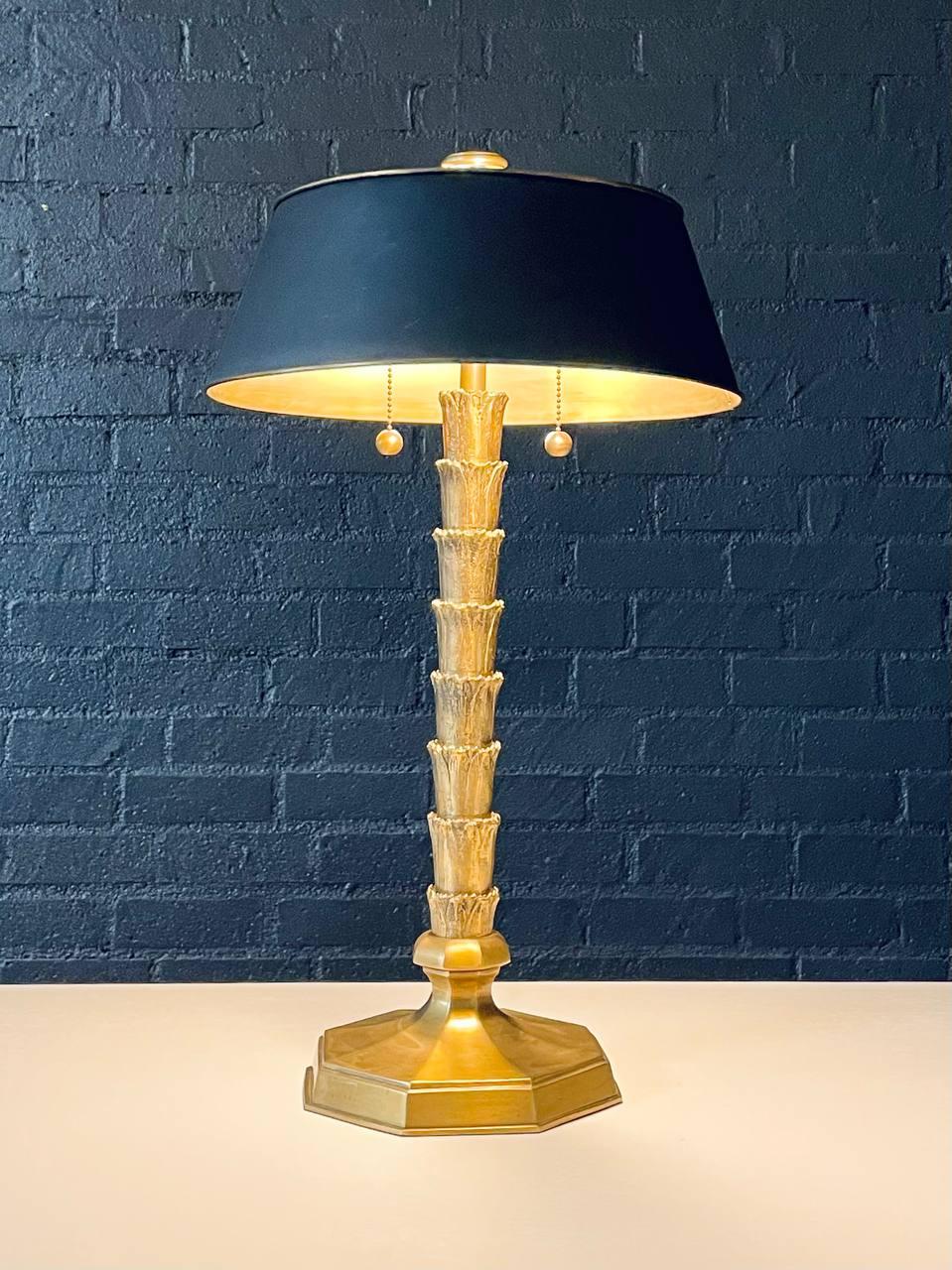 Condition: Original Vintage Condition 
Designer: As You Like It Inc. 
Manufacturer: As You Like It Inc. 
Materials: Patinated Brass, Original Black Metal Shade


This Hollywood Regency table lamp by As You Like It Inc. embodies the glamour and bold
