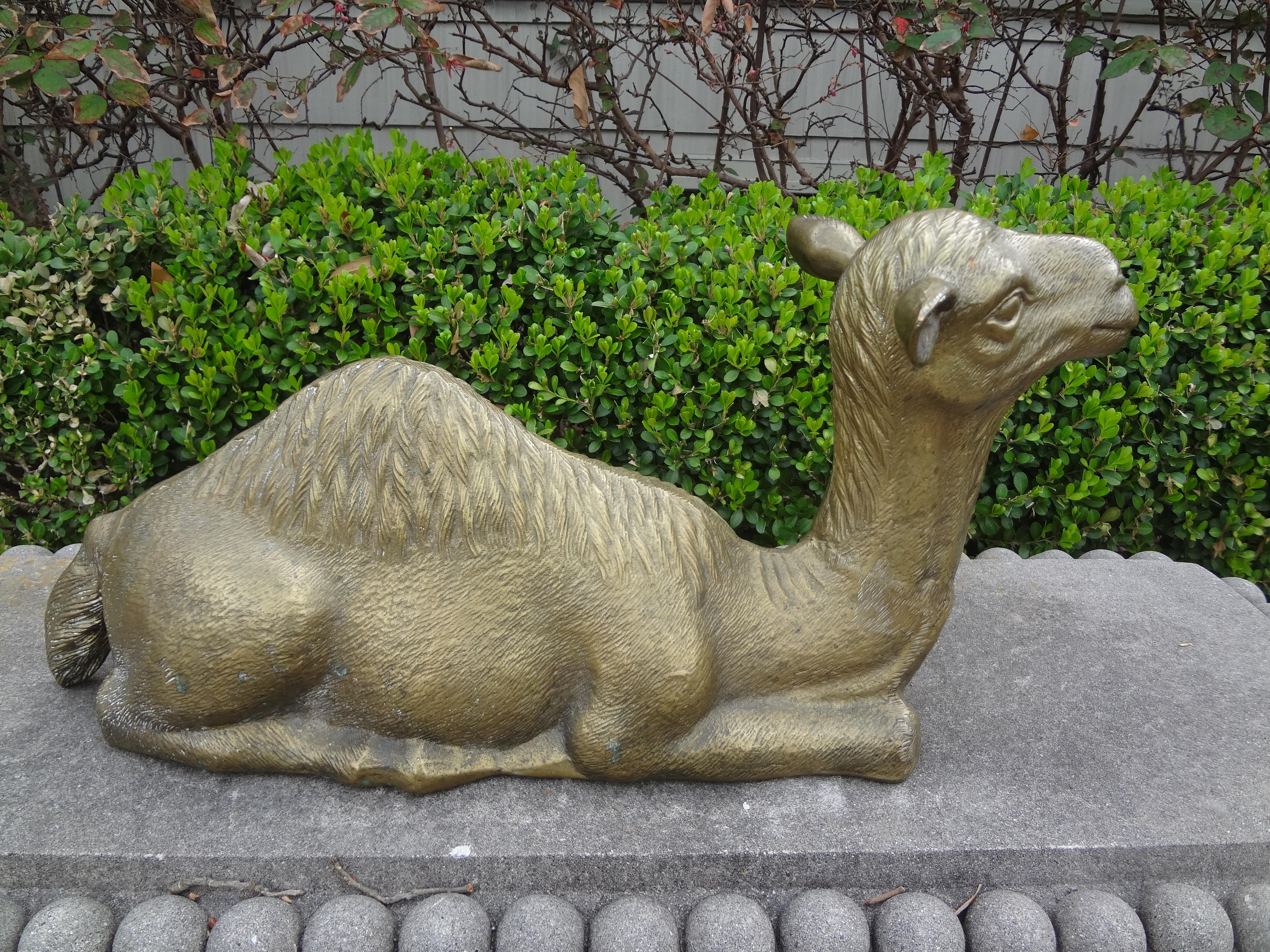 Hollywood Regency brass camel statue.
Unusual large well detailed Hollywood Regency brass camel statue. Our lovely vintage brass camel figure or camel sculpture is executed in a reposed position. A great decorative accessory!