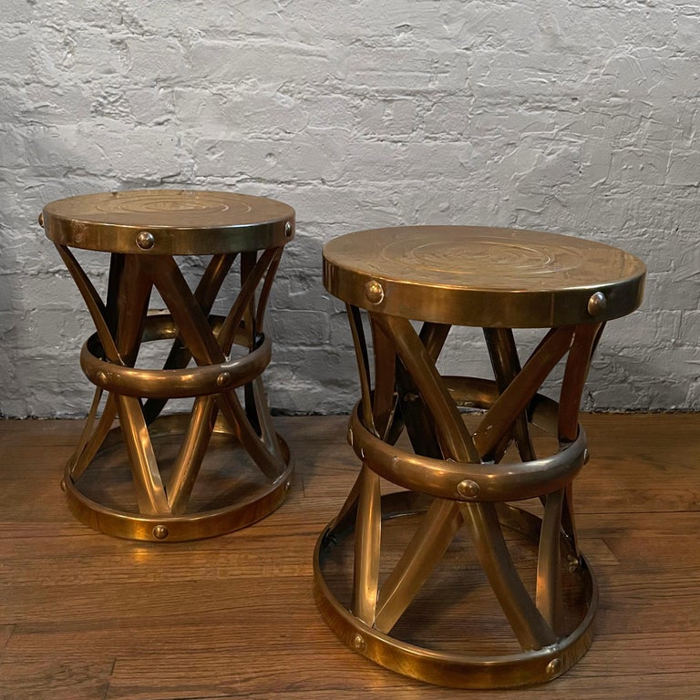Mid-century, Hollywood Regency, brass, drum motif, stool by Sarreid Ltd., Spain. The stool works as a decorative side table as well. Two stools are available, sold individually.