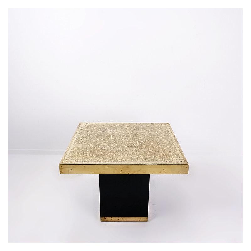 Side table with golden etched top and black footing. Hollywood regency style, made in the 1950's.