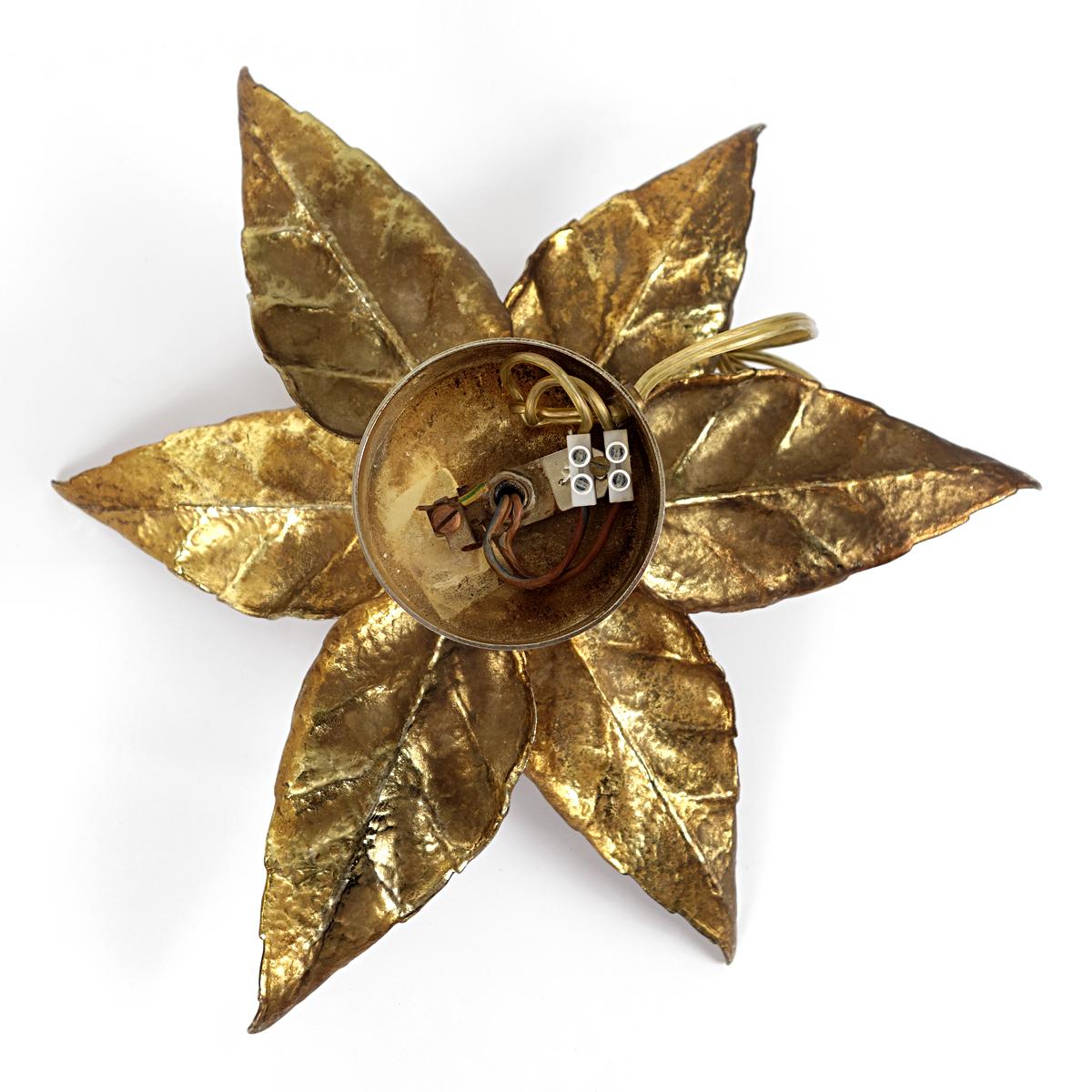 Wonderful brass flushmount or sconce designed by Willy Daro for Massive.