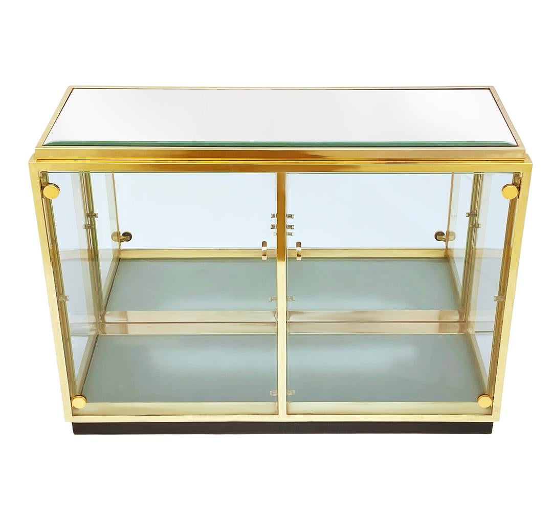 brass and glass display cabinet