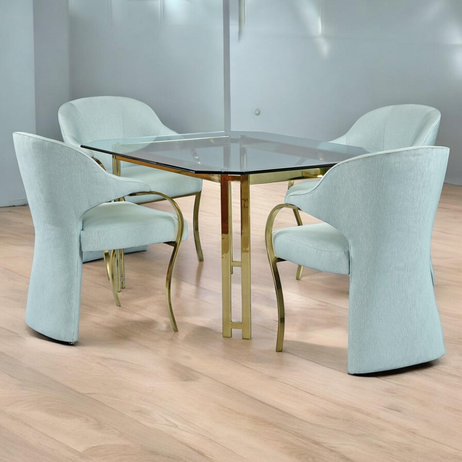 Absolutely fabulous Post-Modern gold colored metal and glass top dining table with four seafoam green armchairs. This set 5-piece Nineteen-Laties dining set is simply stunning. The luxuriously comfortable armchairs are well padded and have cozy