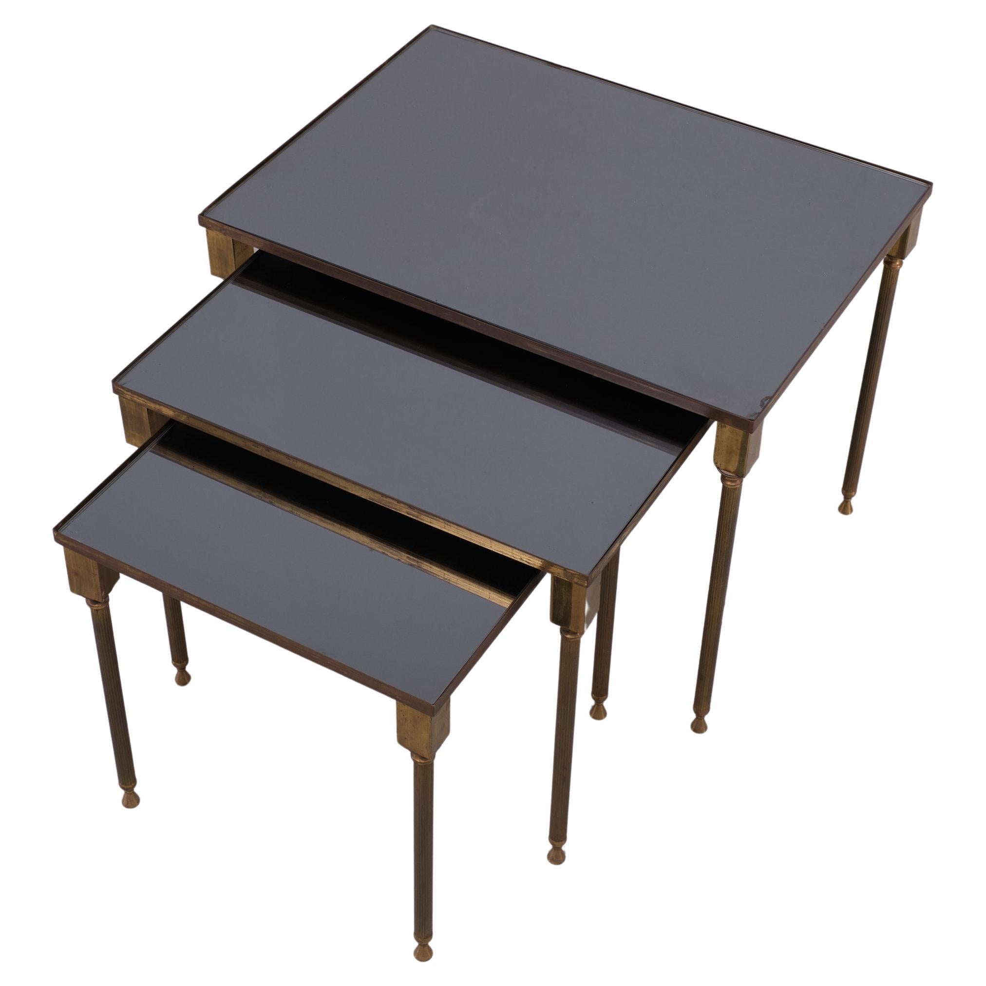 French Hollywood Regency Brass nesting tables by Maison Charles  France 1950s  For Sale