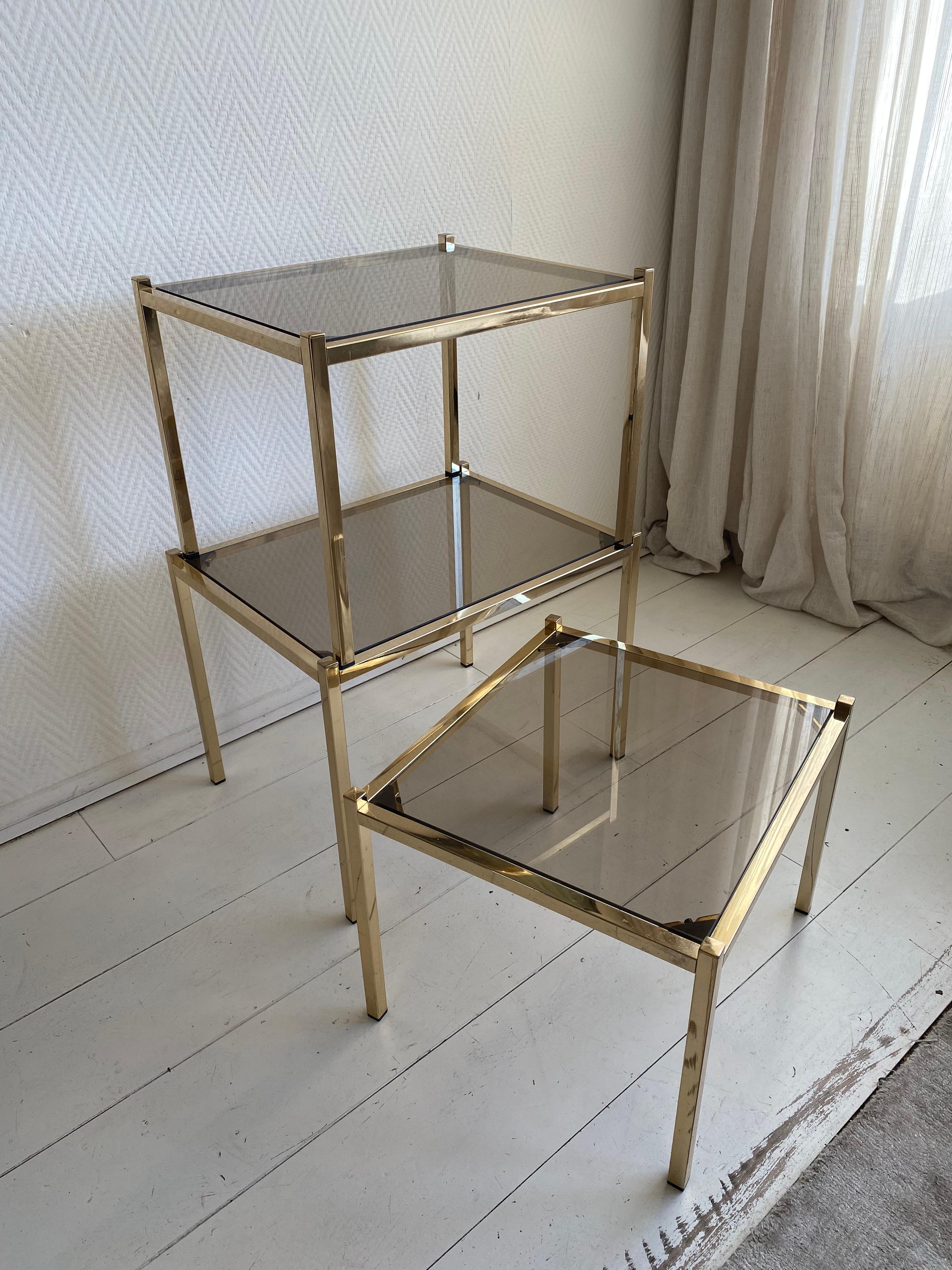 Hollywood Regency Brass Nesting Tables With Smoked Glass For Sale 2