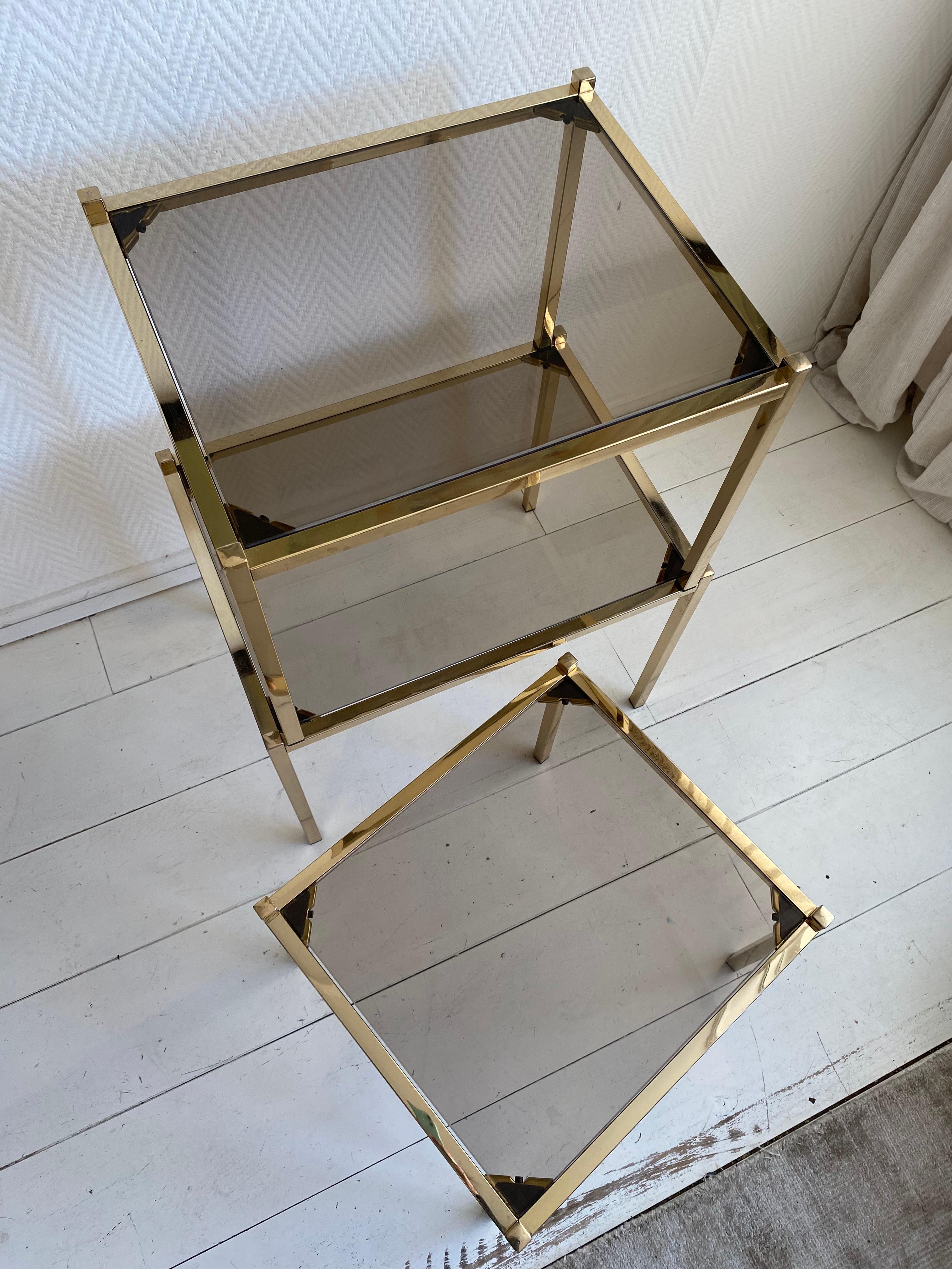 Hollywood Regency Brass Nesting Tables With Smoked Glass For Sale 3