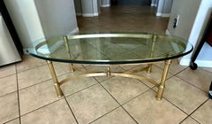 Mesa de centro ovalada de latón Hollywood Regency Made Italy