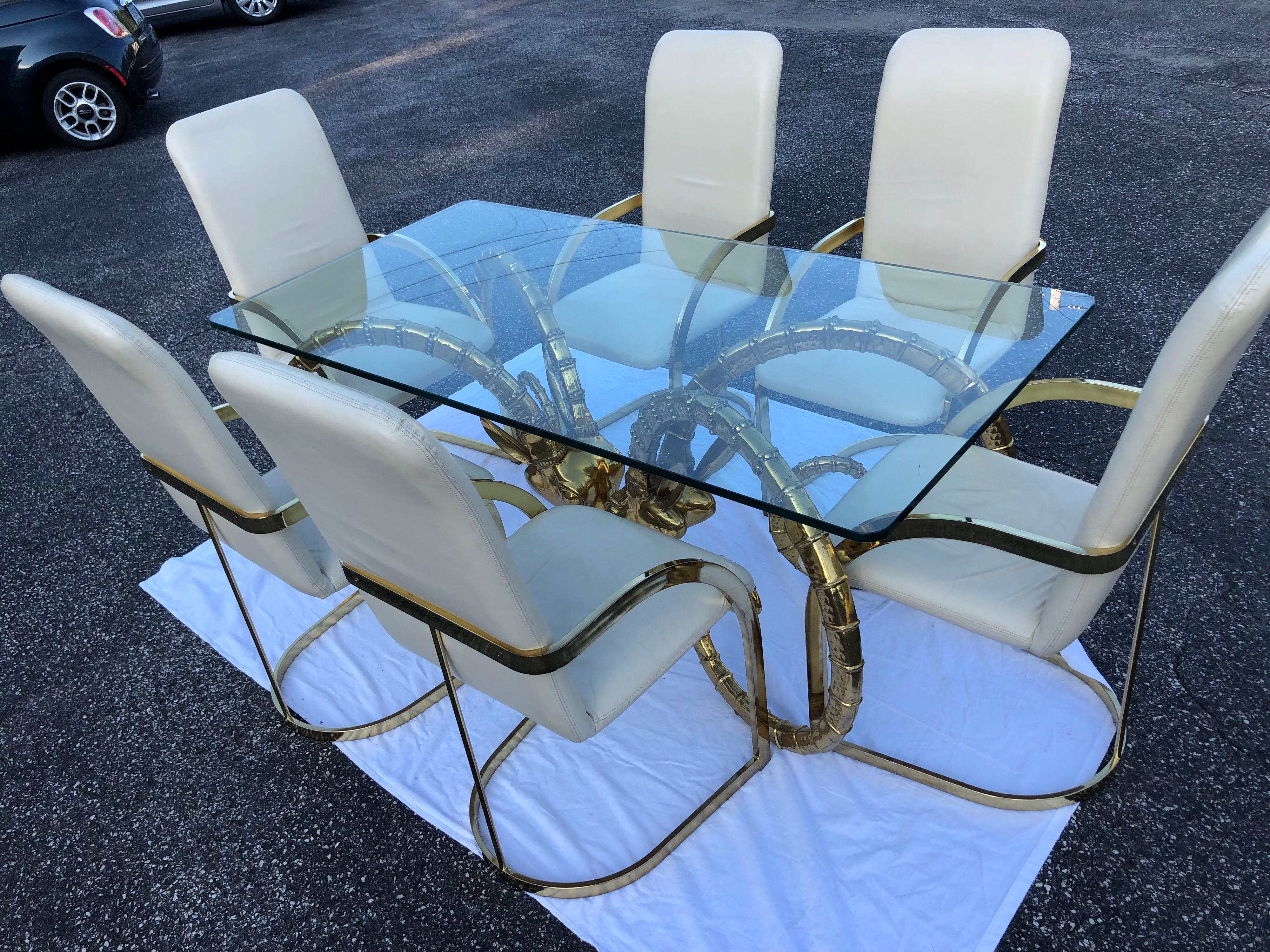 Bronze Hollywood Regency Brass Ram Head Dining Table in the manner of Alain Chervet