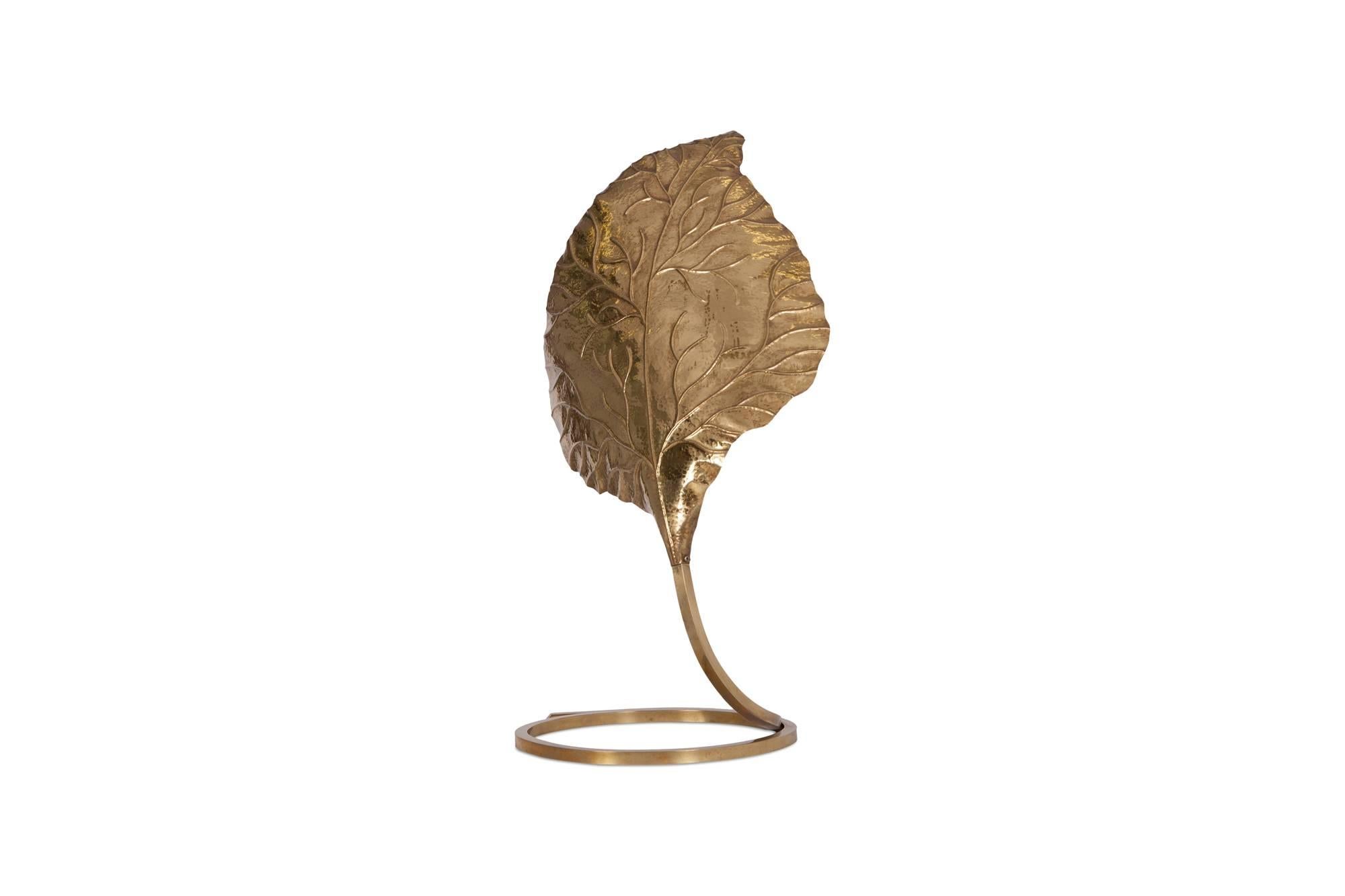 Mid-century modern Brass “Rabarbaro” table lamp by Carlo Giorgi for Bottega Gadda, Italy, 1970s. 
The Rhubarb shaped leaf is completely hammered by hand, showing great skill of craftsmanship which Carlo Giorgi was well known for. The handcrafted