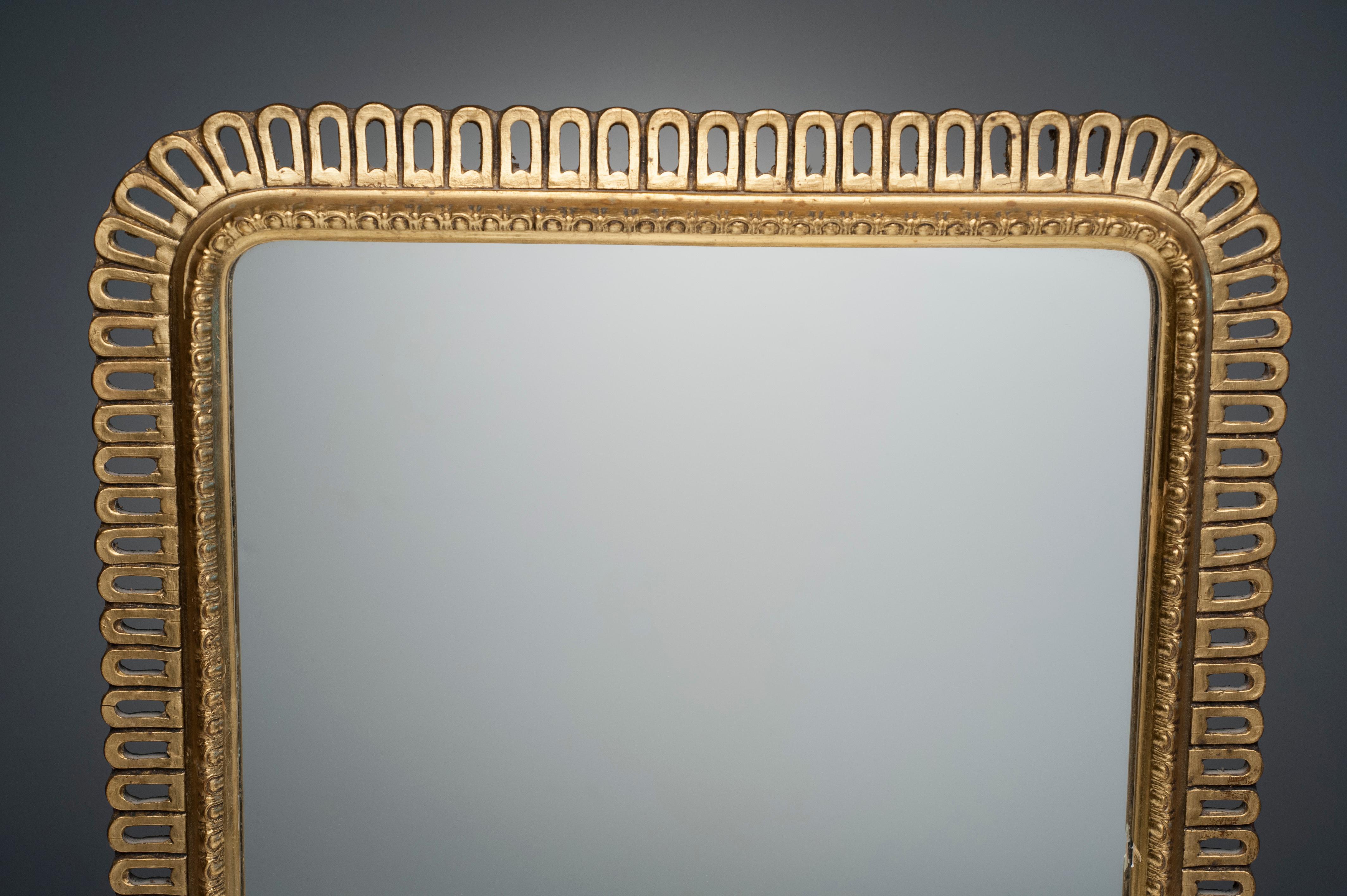 Hollywood Regency Carved Giltwood Rectangular Mirror In Excellent Condition In Washington, DC