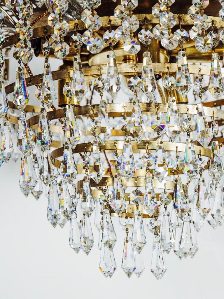 Hand-Crafted Hollywood Regency Cut Crystal Chandelier with Cascading Brass Frame, c. 1950's For Sale