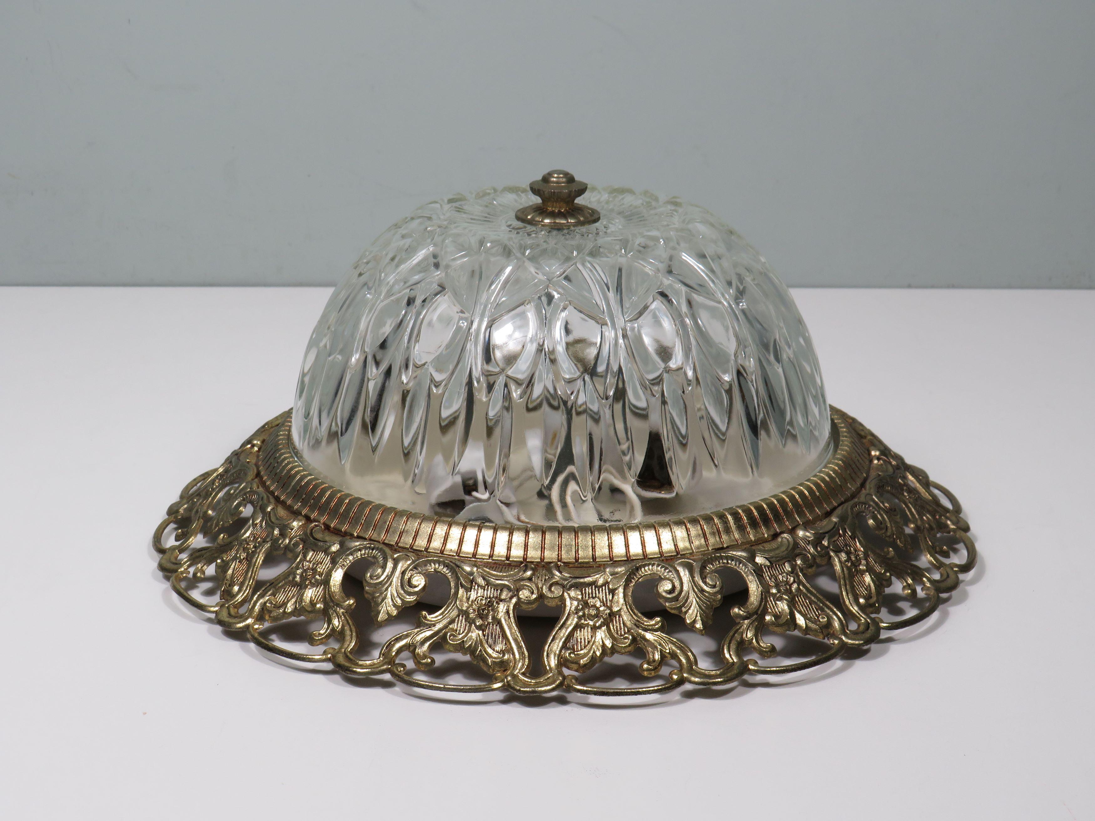Gilt Hollywood Regency ceiling lamp, cut glass and openwork gilded edge. For Sale