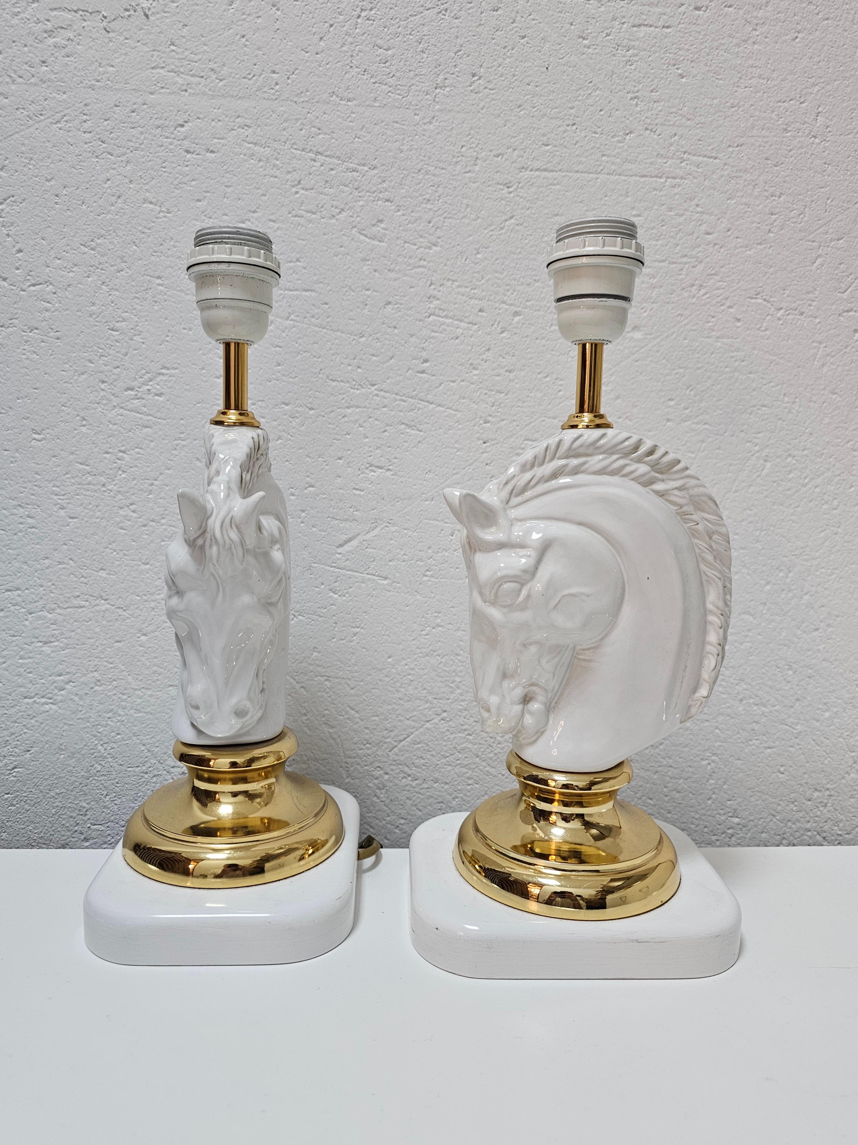 In this listing you will find a pair of very attractive Hollywood Regency Table Lamps done in white ceramics and brass. The lamps are shaped as horse heads, with strong and expressive features and strong musculature. Made in Austria in 1970s.

Lamps