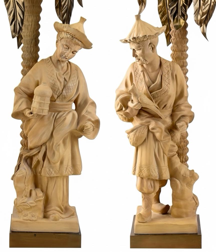 This is a pair of Hollywood Regency style terracotta and brass palm lamps by Chapman Manufacturing. They depict male and female facing Asian pastoral figures. Both lamps have a brass base that is 4.5 inches square. Each lamp has cascading brass palm
