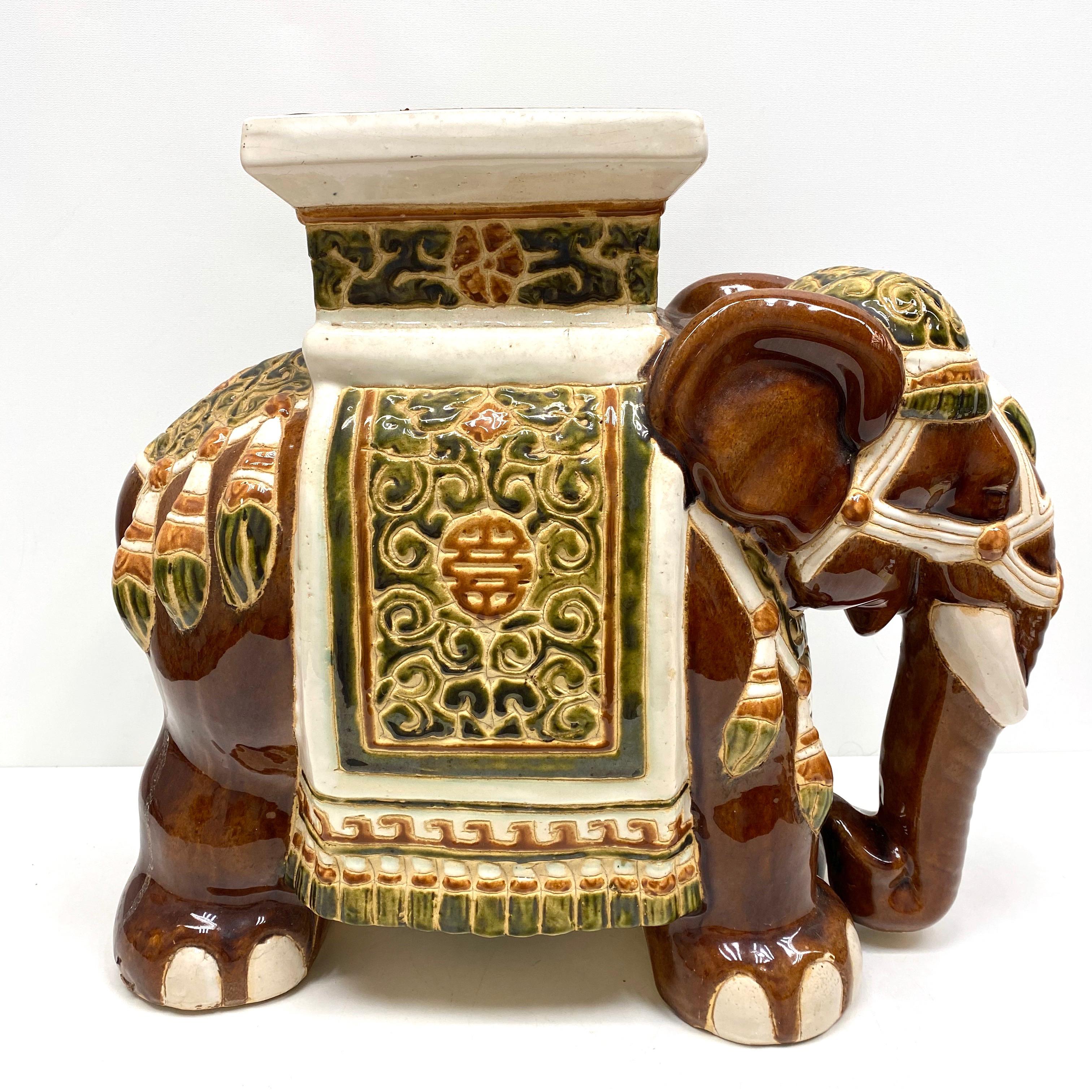 Mid-20th century glazed ceramic elephant garden stool, flower pot seat or side table. Handmade of ceramic. Nice addition to your home, patio or garden. A nice addition to any room, patio or yard.
 