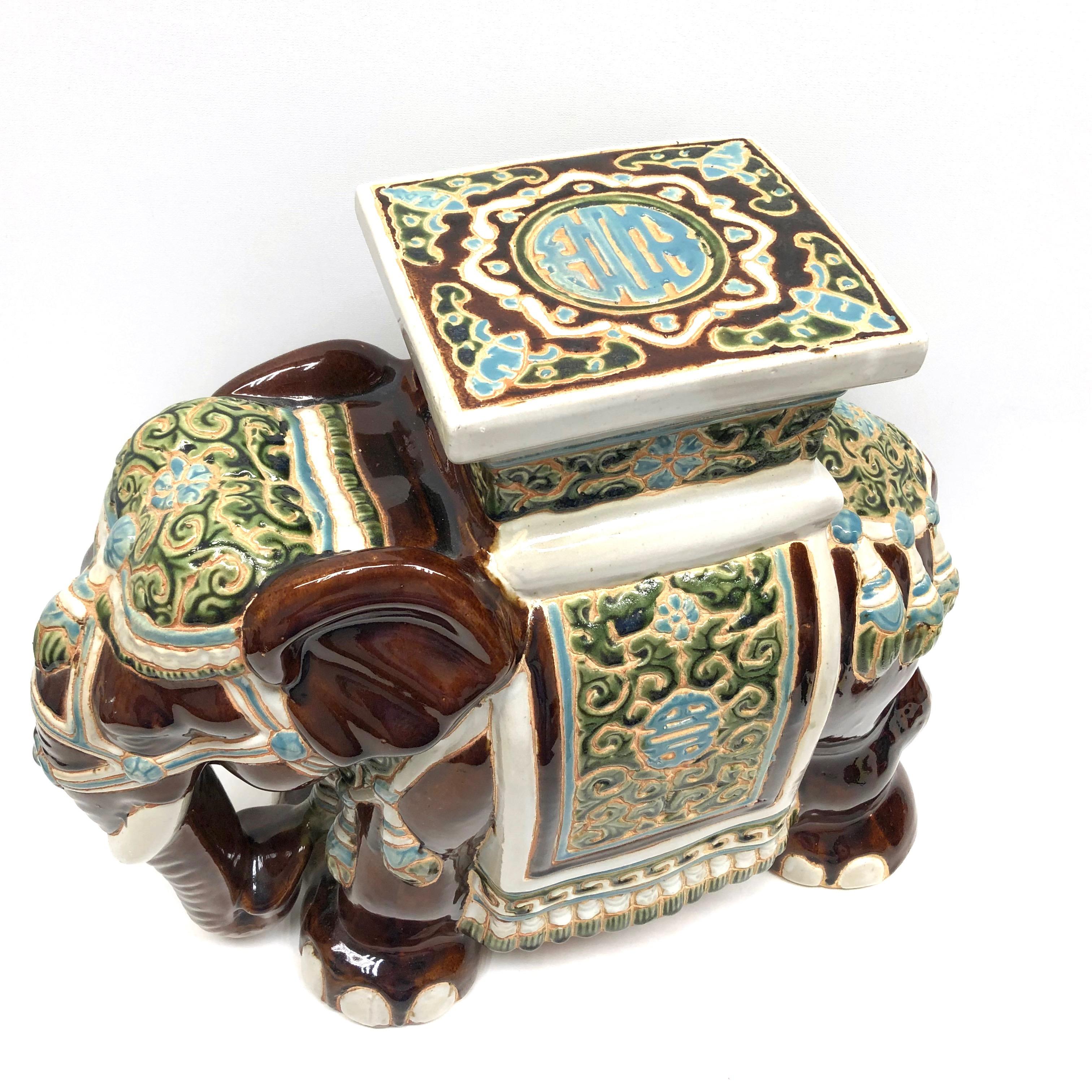 Mid-20th century glazed ceramic elephant garden stool, flower pot seat or side table. Handmade of ceramic. Nice addition to your home, patio or garden. A nice addition to any room, patio or yard.
  