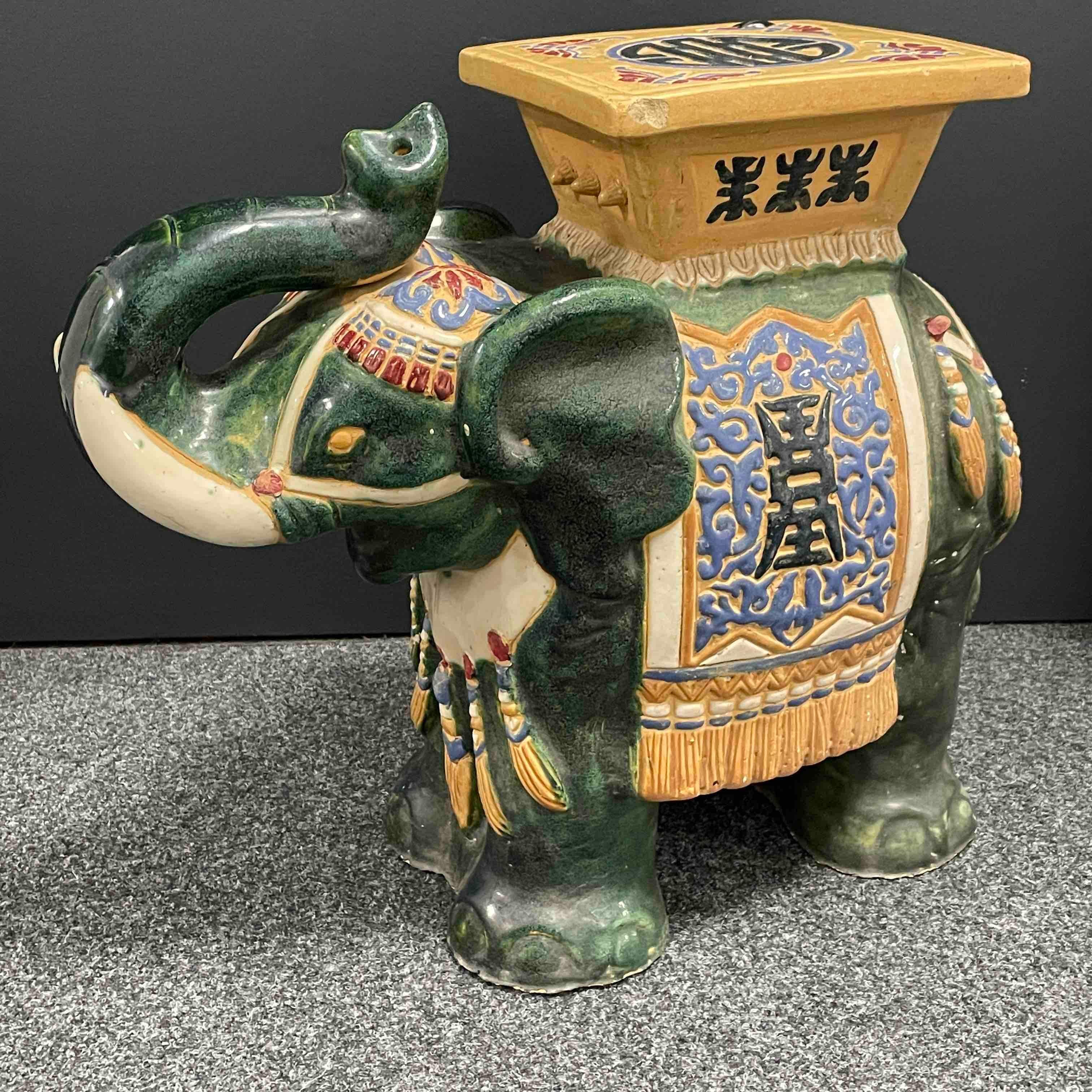 Mid-20th century glazed ceramic elephant garden stool, flower pot seat or side table. Handmade of ceramic. Nice addition to your home, patio or garden. A nice addition to any room, patio or yard.
 