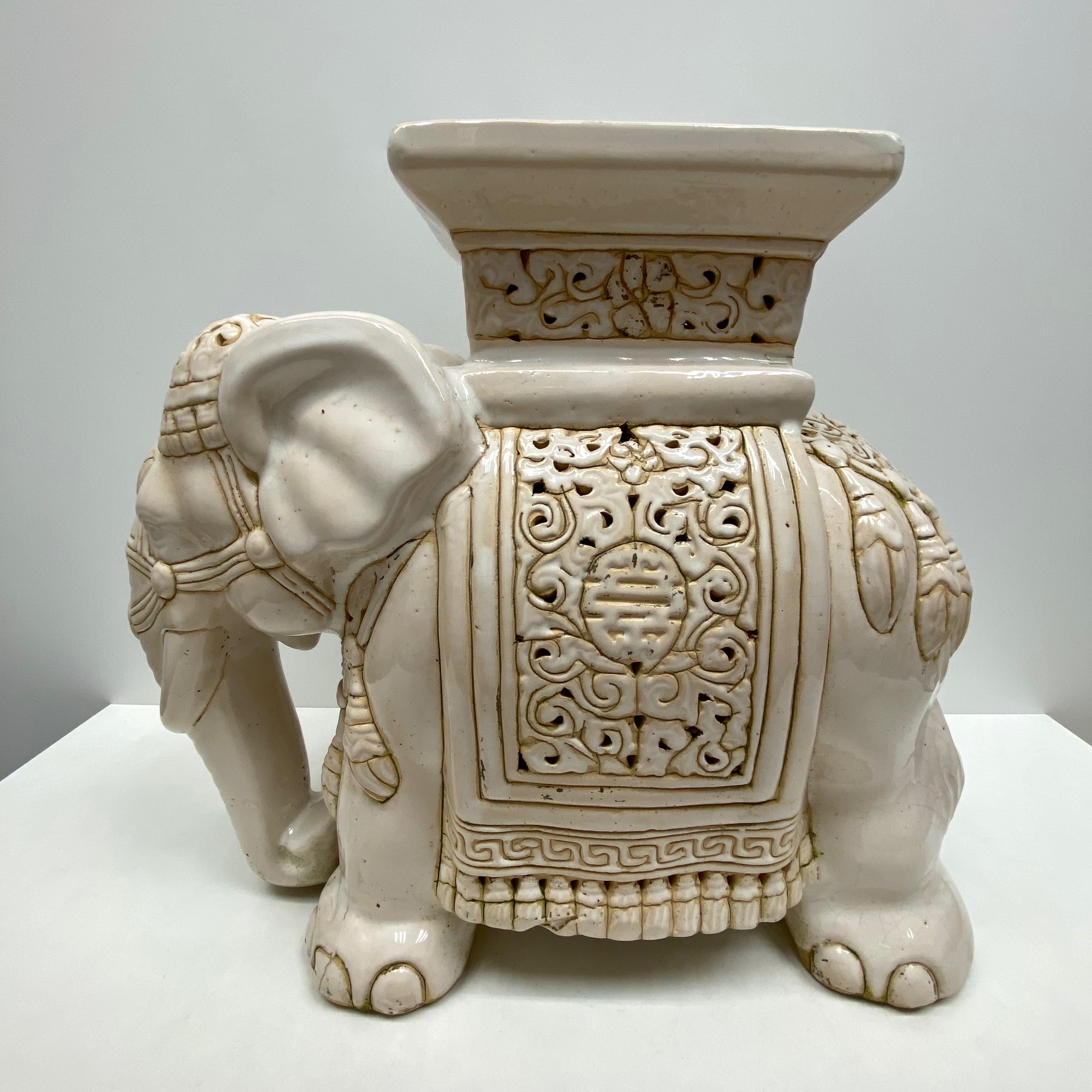Mid-20th century glazed ceramic elephant garden stool, flower pot seat or side table. Handmade of ceramic. Nice addition to your home, patio or garden. A nice addition to any room, patio or yard.
 