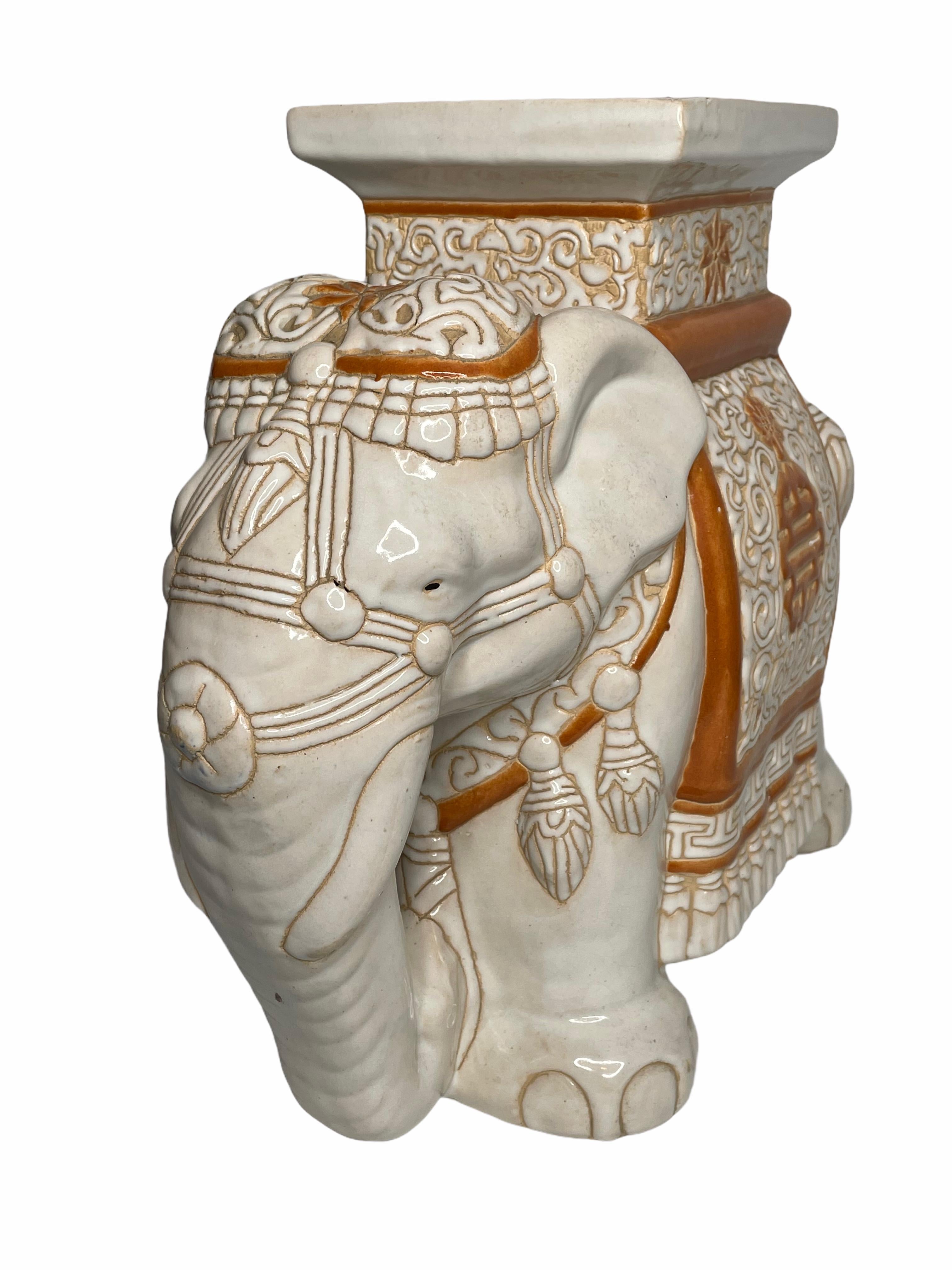 Mid-20th century glazed ceramic elephant garden stool, flower pot seat or side table. Handmade of ceramic. Nice addition to your home, patio or garden. A nice addition to any room, patio or yard.
  