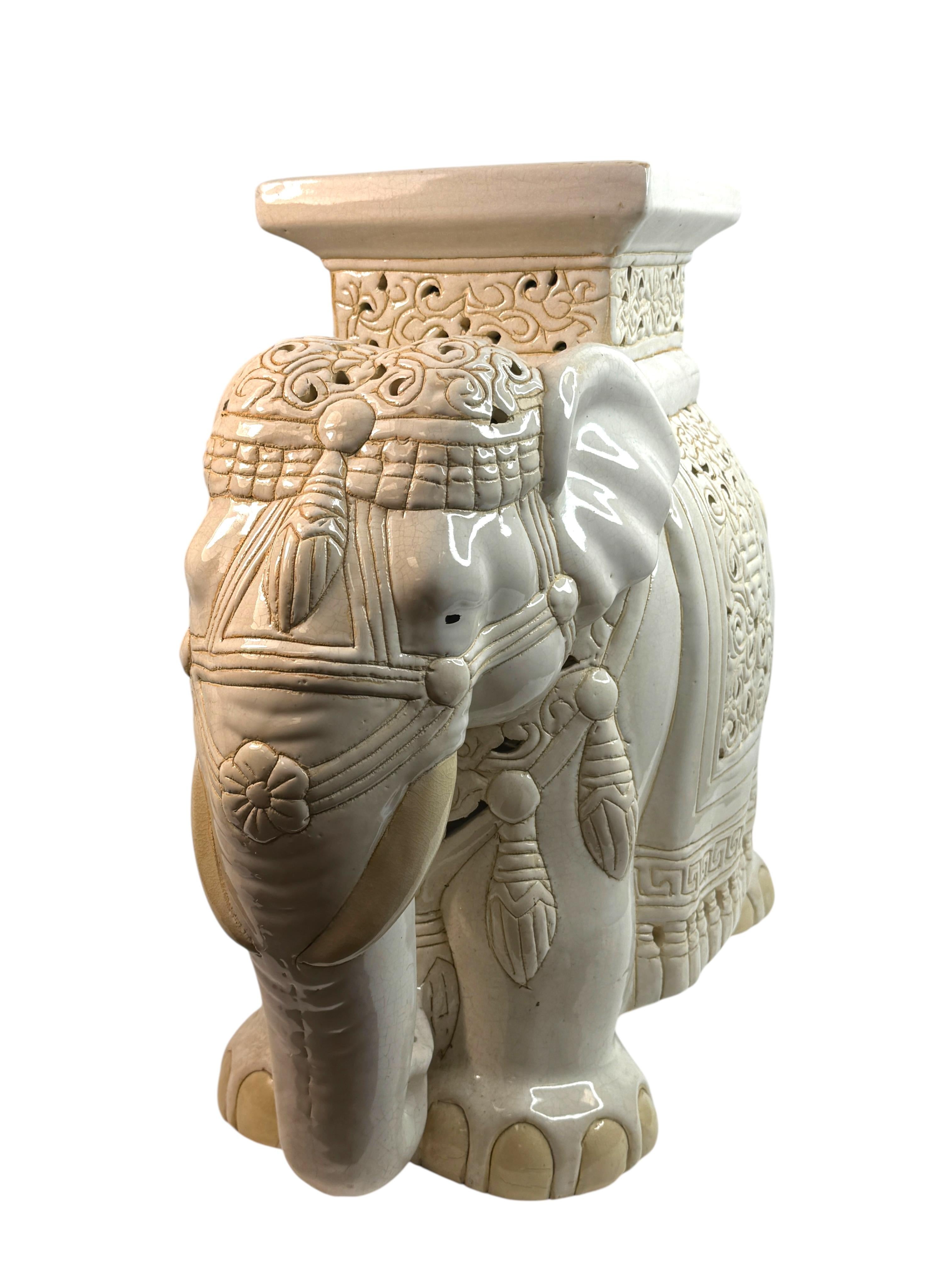 Mid-20th century glazed ceramic elephant garden stool, flower pot seat or side table. Handmade of ceramic. Nice addition to your home, patio or garden. A nice addition to any room, patio or yard. Also nice at the pool as a drinks stand. Found at an