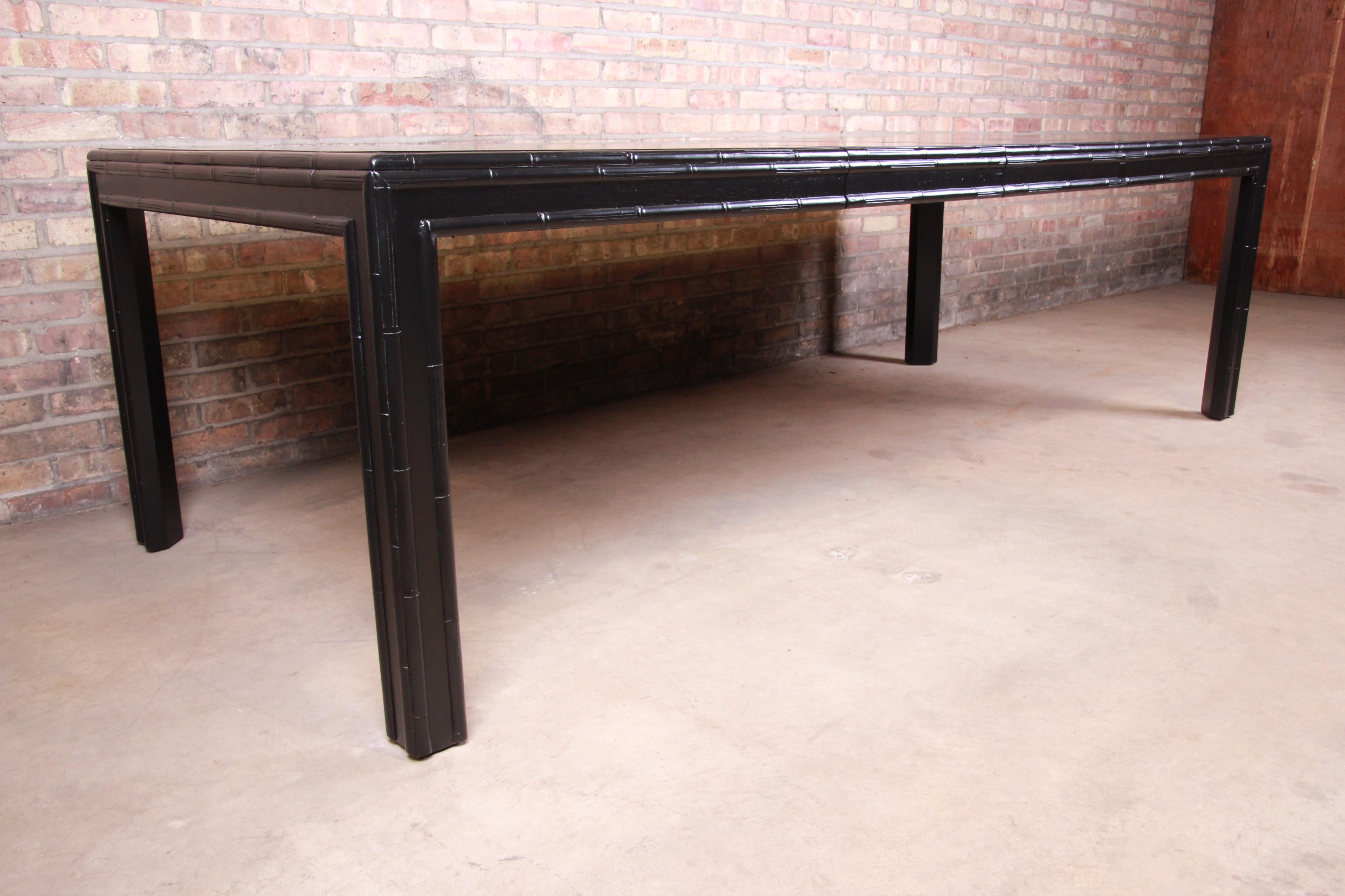 Mid-20th Century Hollywood Regency Chinoiserie Faux Bamboo Black Lacquered Extension Dining Table