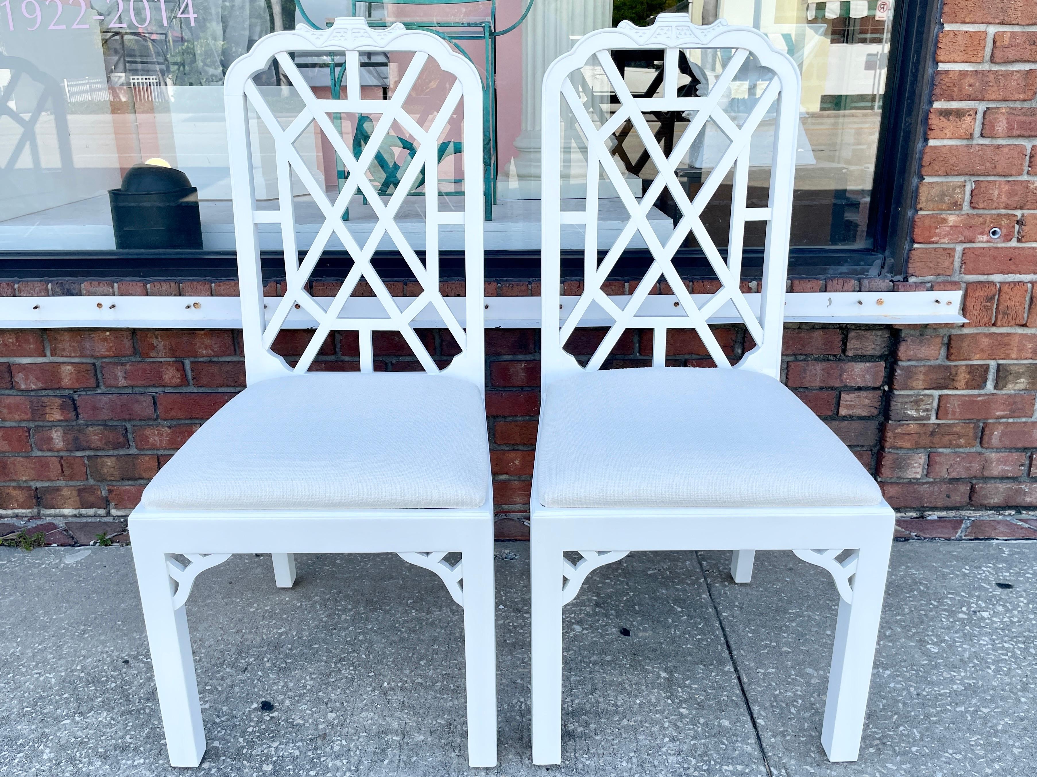 Fabulous pair of freshly lacquered in white boho chic dining chairs in new Todd Hase Textiles. Great addition to your boho chic inspired home.

      